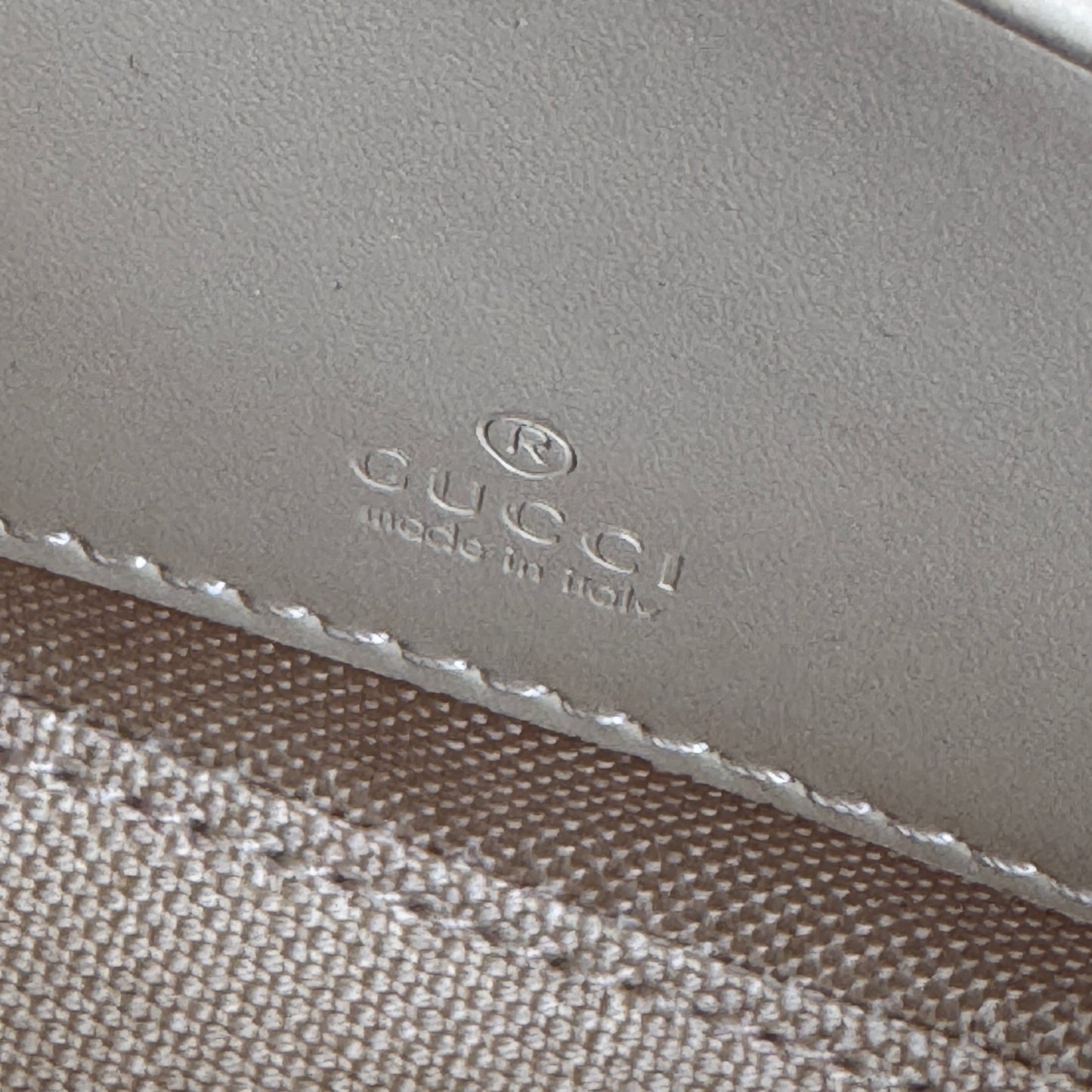 Gucci Calfskin GG Super Mini Debossed Chain Wallet Crossbody