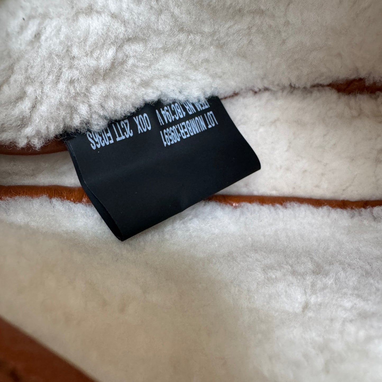 Prada Arqué Small Shearling Shoulder Bag