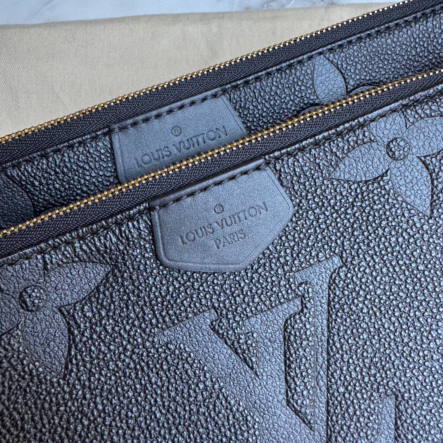 Louis Vuitton Multi Pochette Empreinte Crossbody
