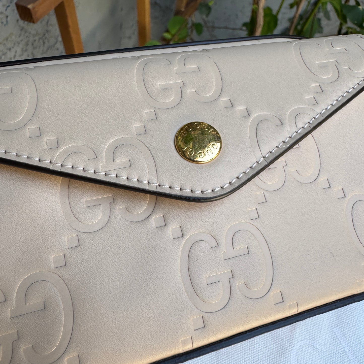 Gucci Calfskin GG Super Mini Debossed Chain Wallet Crossbody