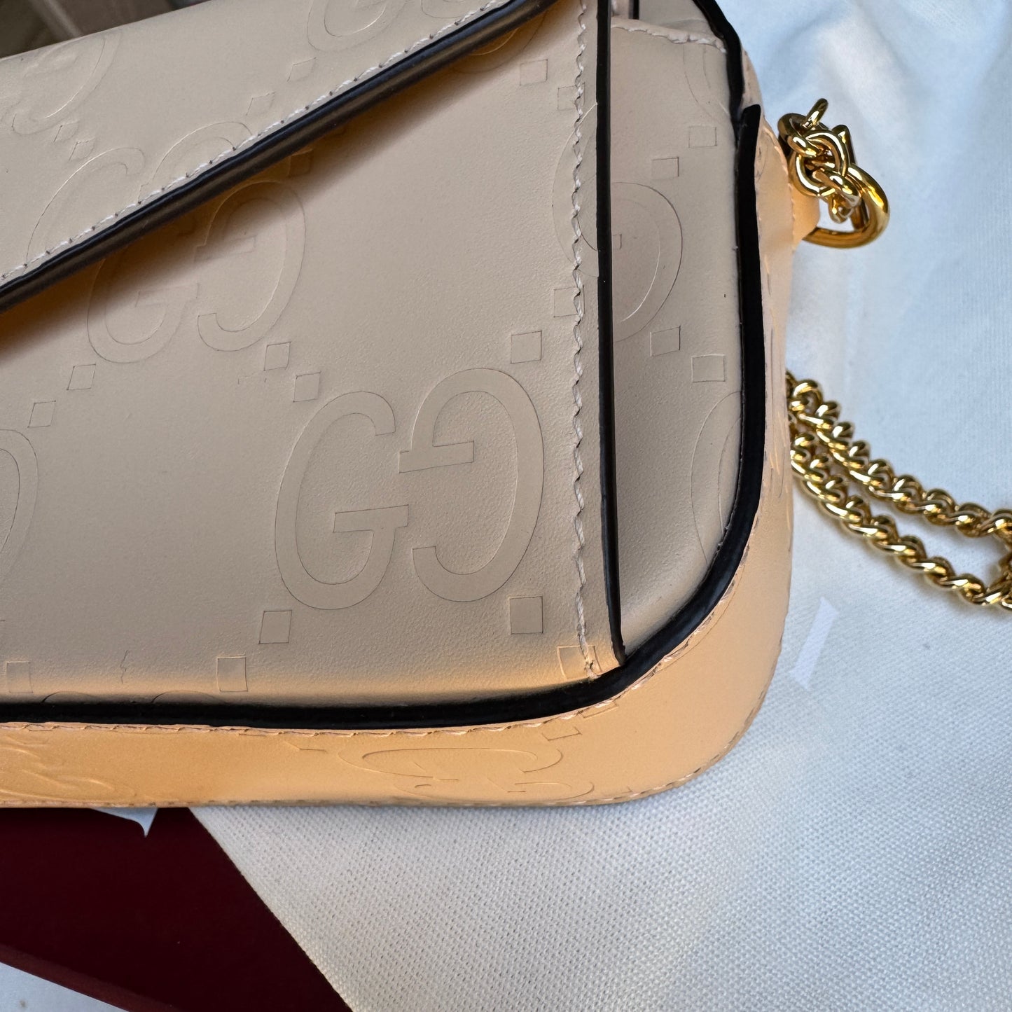 Gucci Calfskin GG Super Mini Debossed Chain Wallet Crossbody
