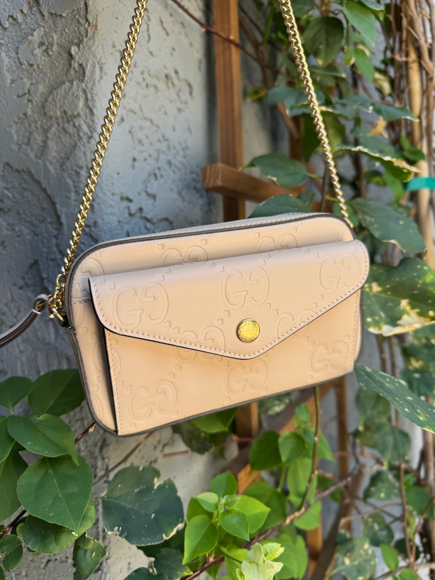 Gucci Calfskin GG Super Mini Debossed Chain Wallet Crossbody