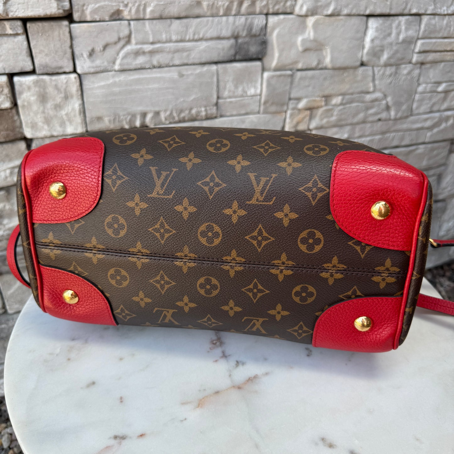 Louis Vuitton Leather and Monogram Canvas Retiro NM