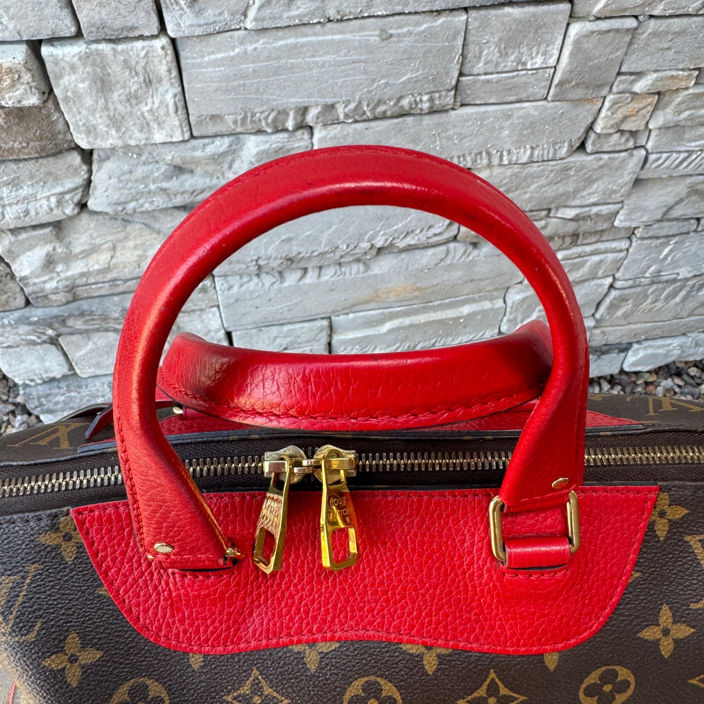 Louis Vuitton Leather and Monogram Canvas Retiro NM