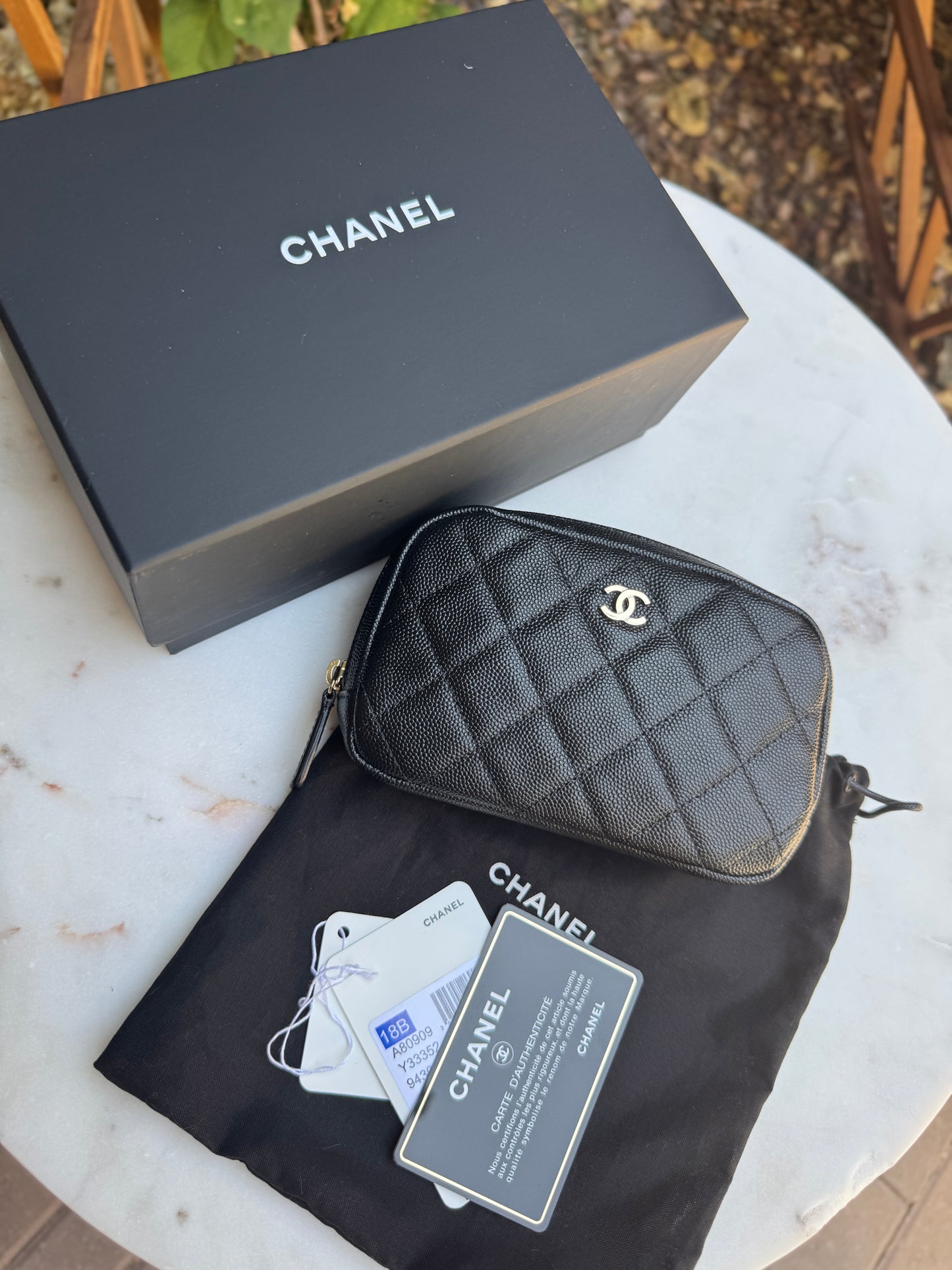 Chanel Small Curvy Quilted Caviar Cosmetic Pouch