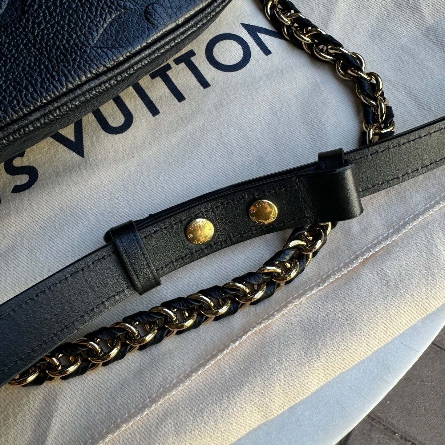 Louis Vuitton Multi Pochette Empreinte Crossbody
