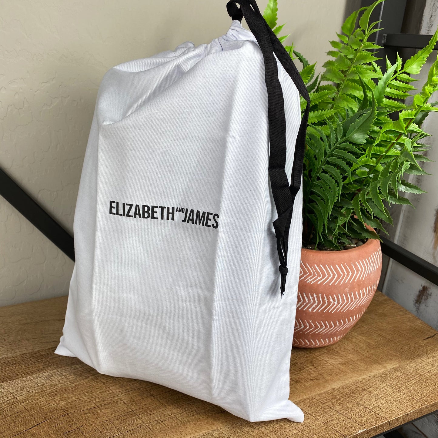 Elizabeth and James Lambskin Palm Leaf Crossbody Bag