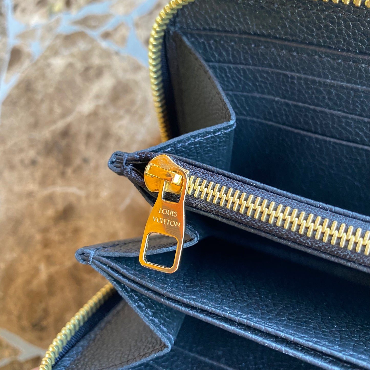 Louis Vuitton Monogram Empreinte Leather Zippy Wallet