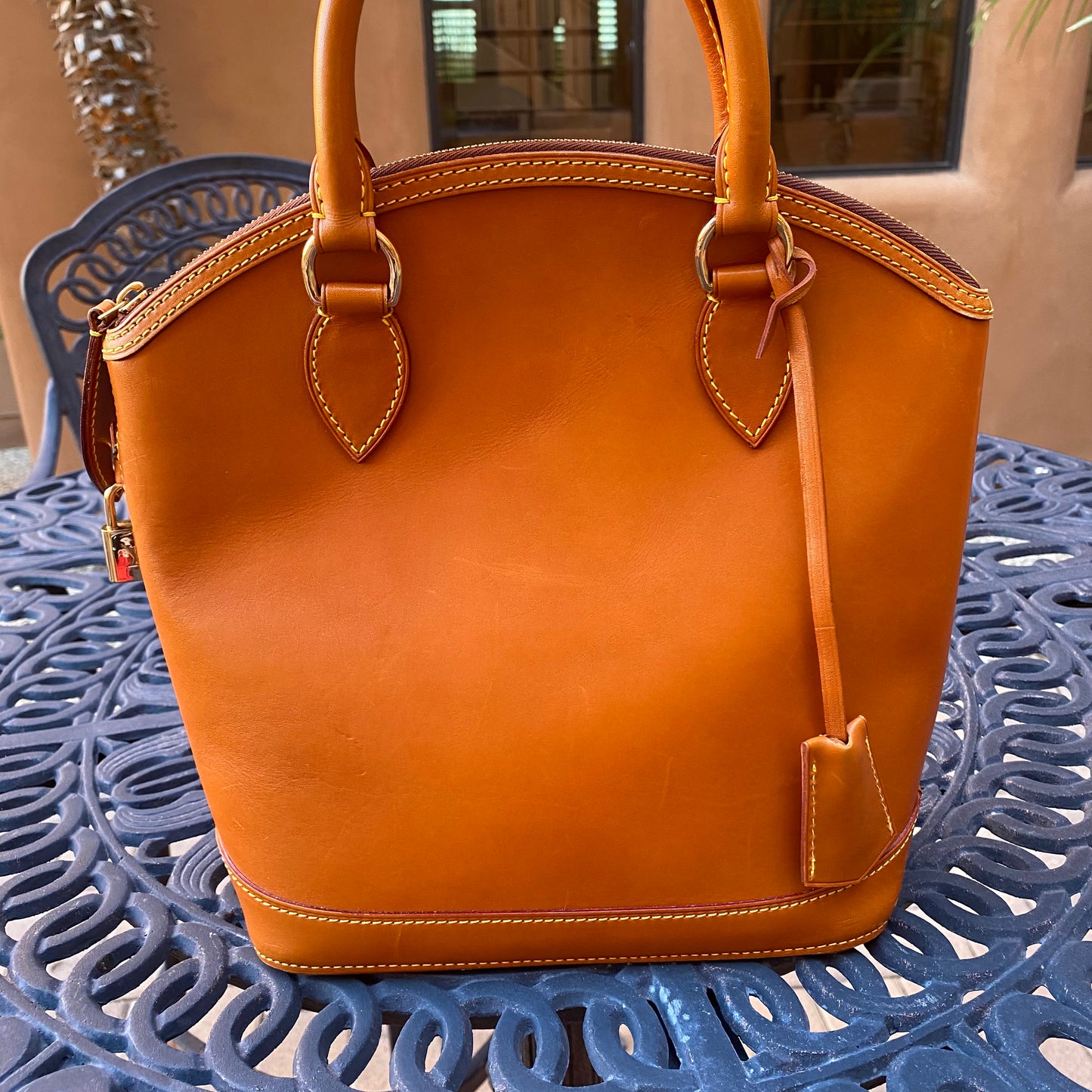 Louis Vuitton Nomade Vertical Lockit Satchel