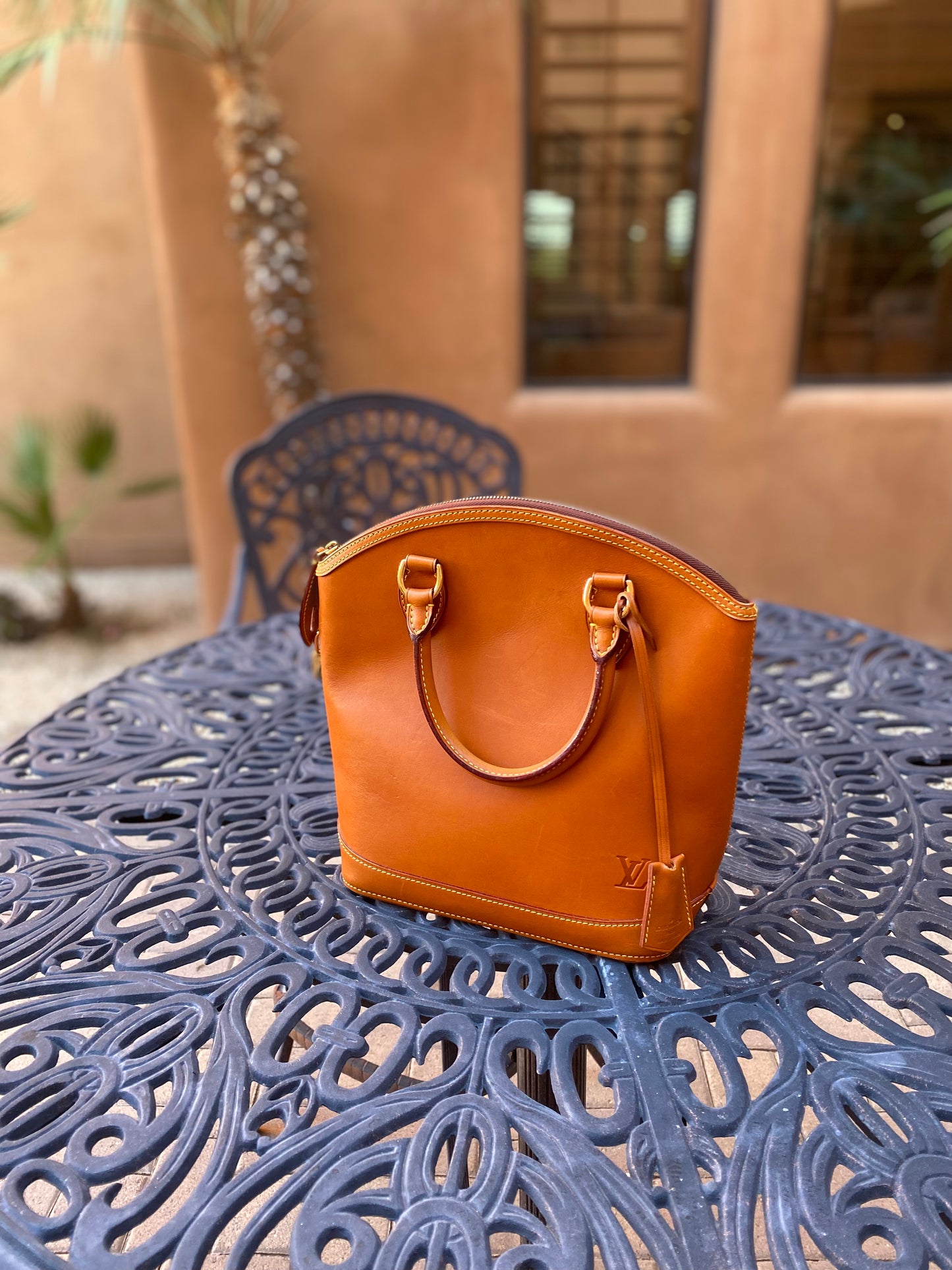 Louis Vuitton Nomade Vertical Lockit Satchel