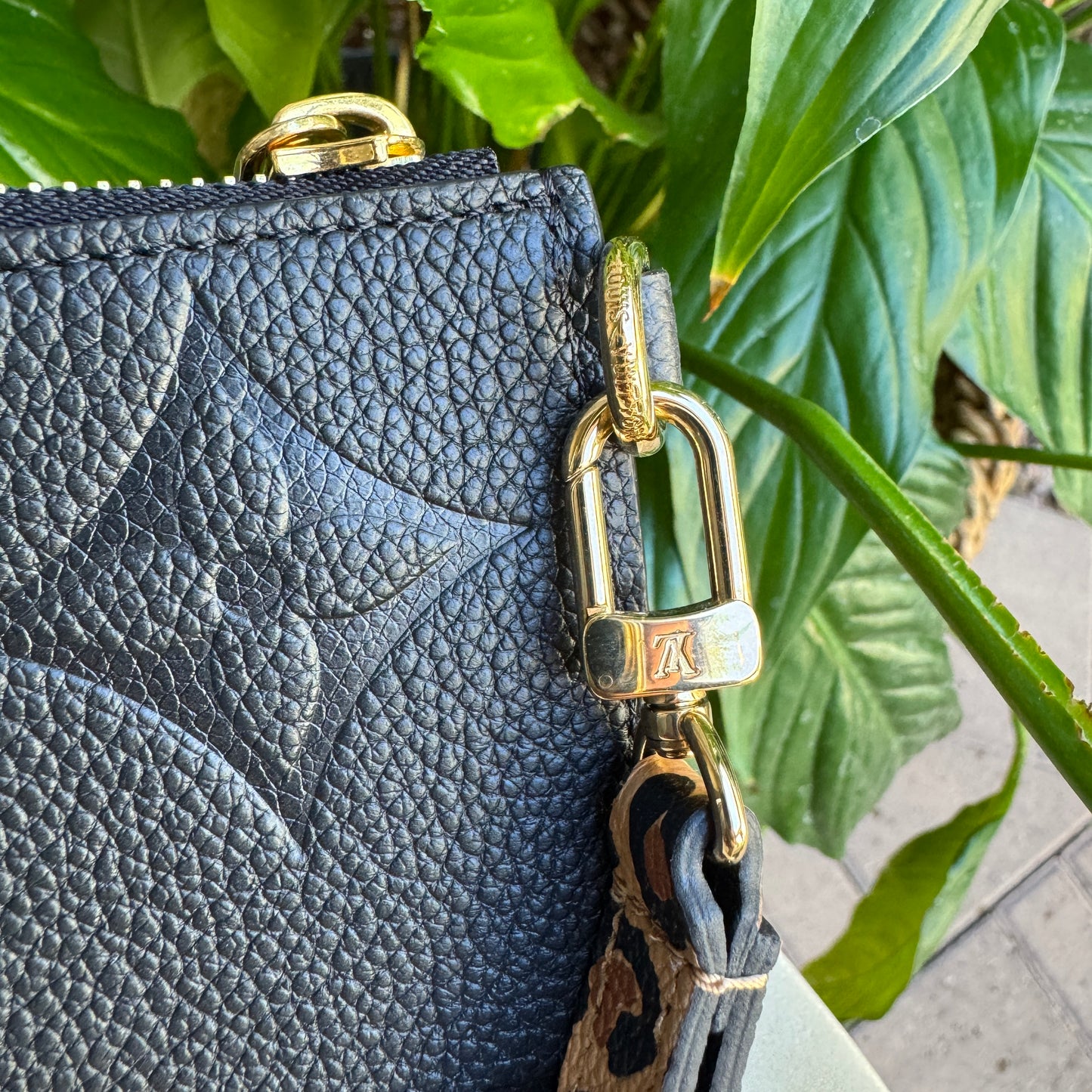 Louis Vuitton Empreinte Monogram Giant Wild at Heart Pochette Wristlet