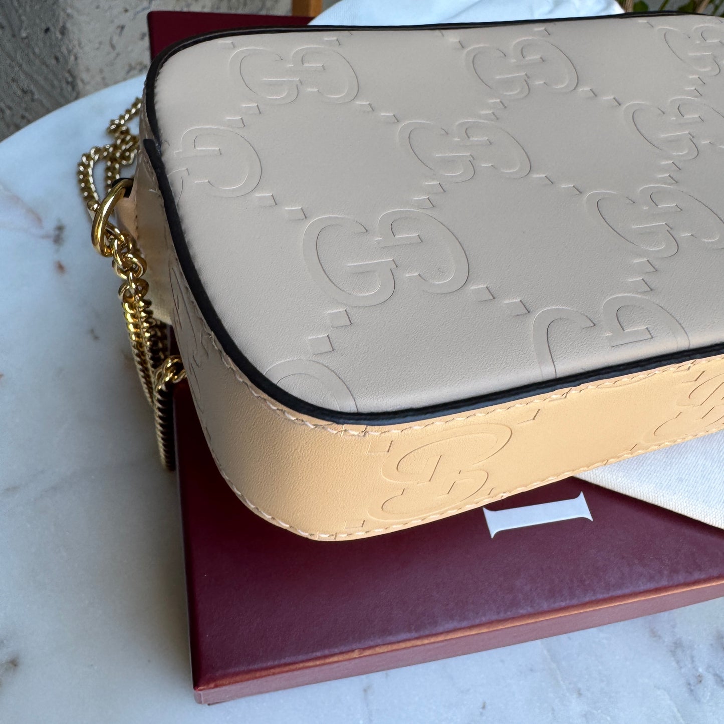 Gucci Calfskin GG Super Mini Debossed Chain Wallet Crossbody