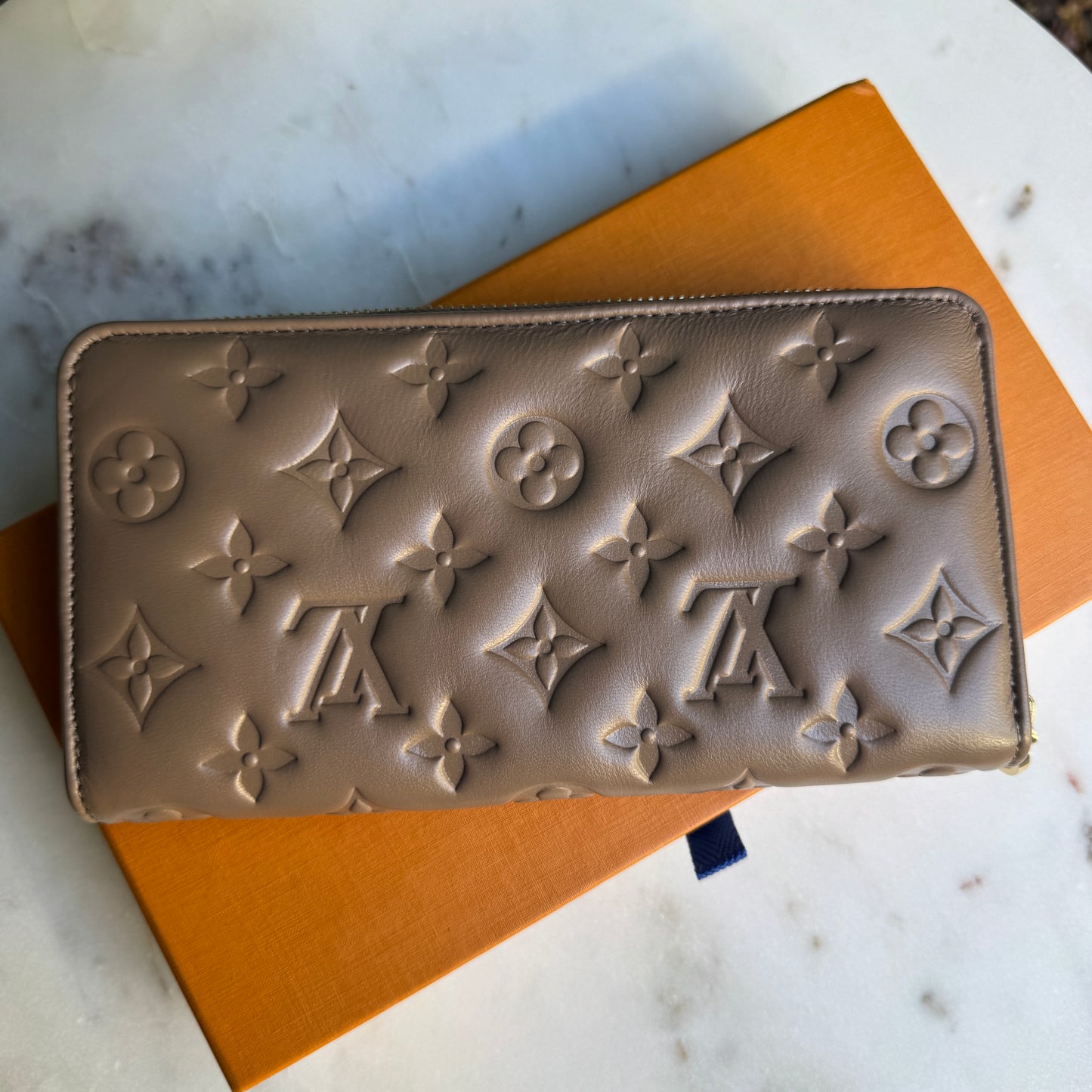 Louis Vuitton Coussin Empreinte Monogram Leather Zippy Wallet