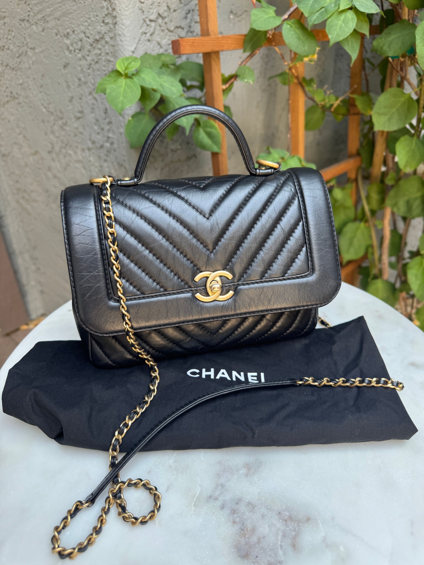 Chanel Calfskin Chevron Quilted Top Handle Flap Crossbody