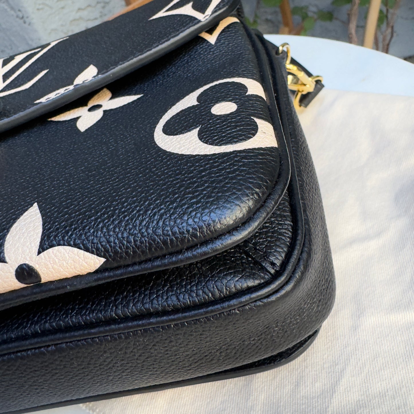 Louis Vuitton Bicolor Empreinte Leather Pochette Metis