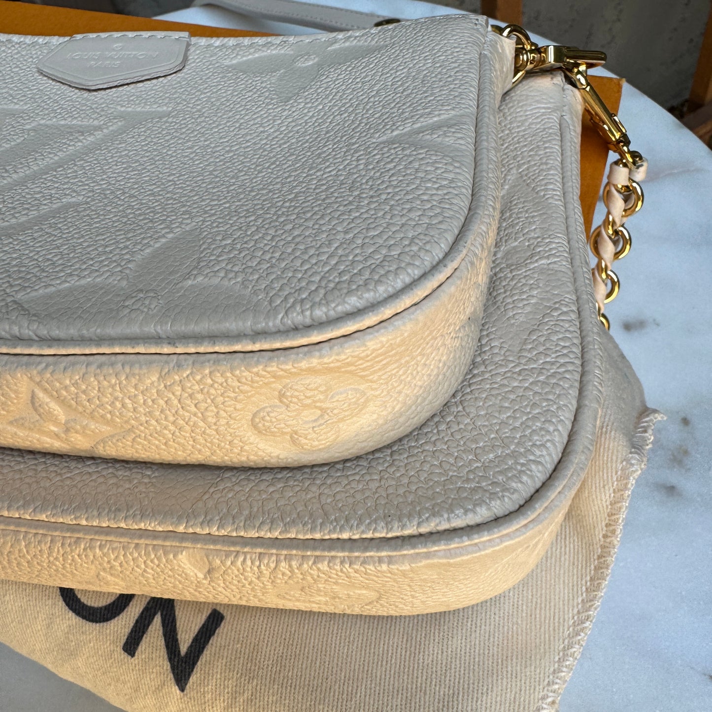 Louis Vuitton Multi Pochette Empreinte Crossbody