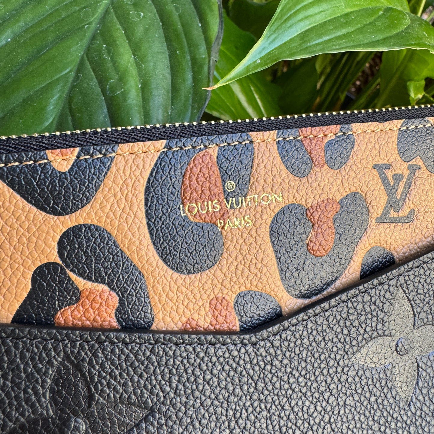 Louis Vuitton Empreinte Monogram Giant Wild at Heart Pochette Wristlet