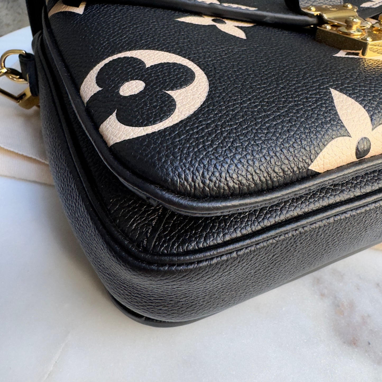 Louis Vuitton Bicolor Empreinte Leather Pochette Metis