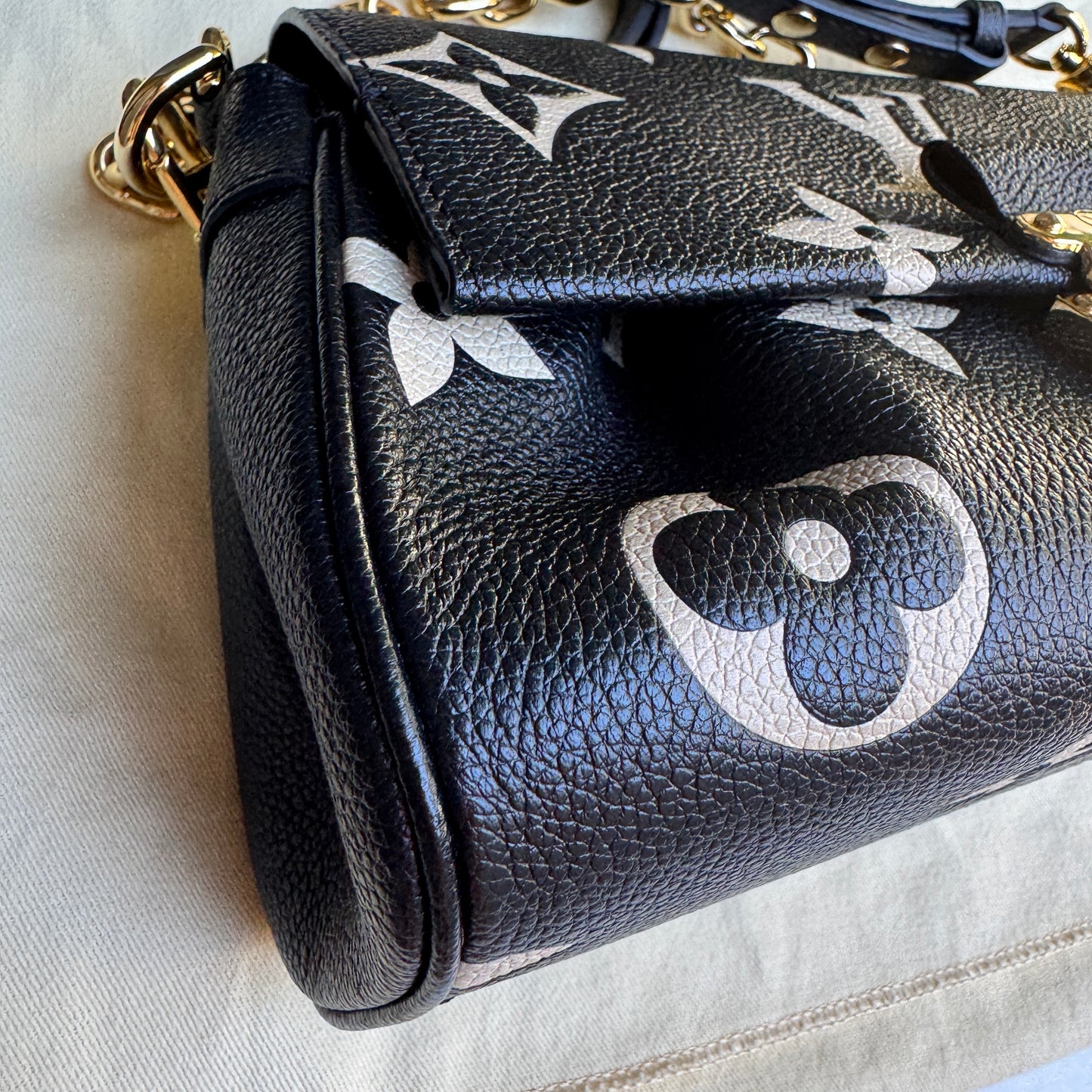 Louis Vuitton Giant Bicolor Monogram Empreinte Favorite NM Crossbody