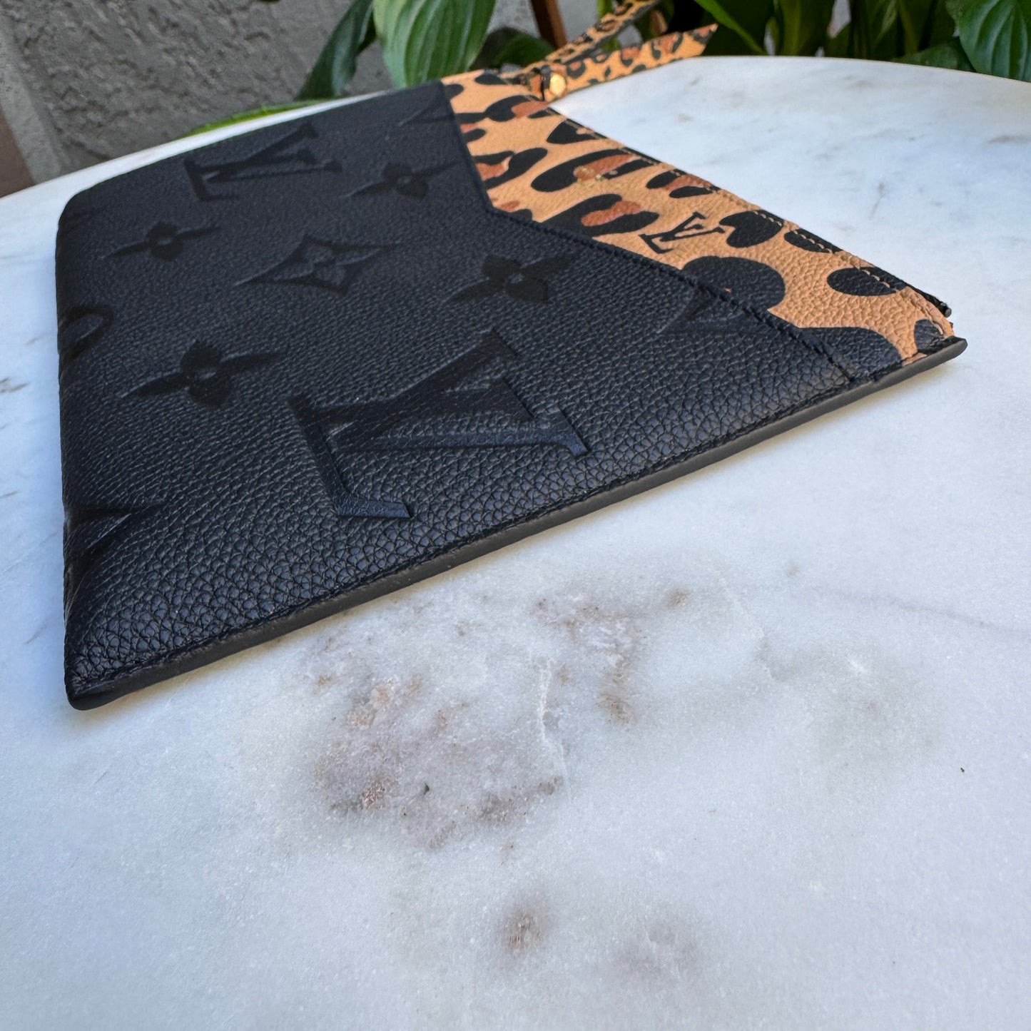 Louis Vuitton Empreinte Monogram Giant Wild at Heart Pochette Wristlet