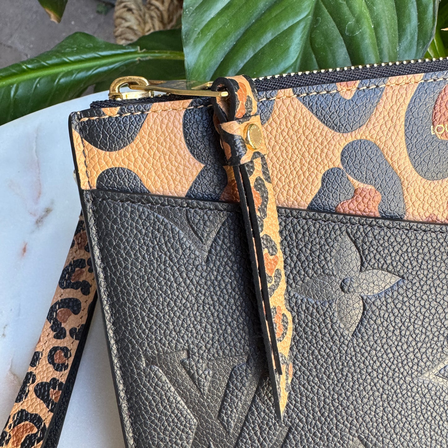 Louis Vuitton Empreinte Monogram Giant Wild at Heart Pochette Wristlet