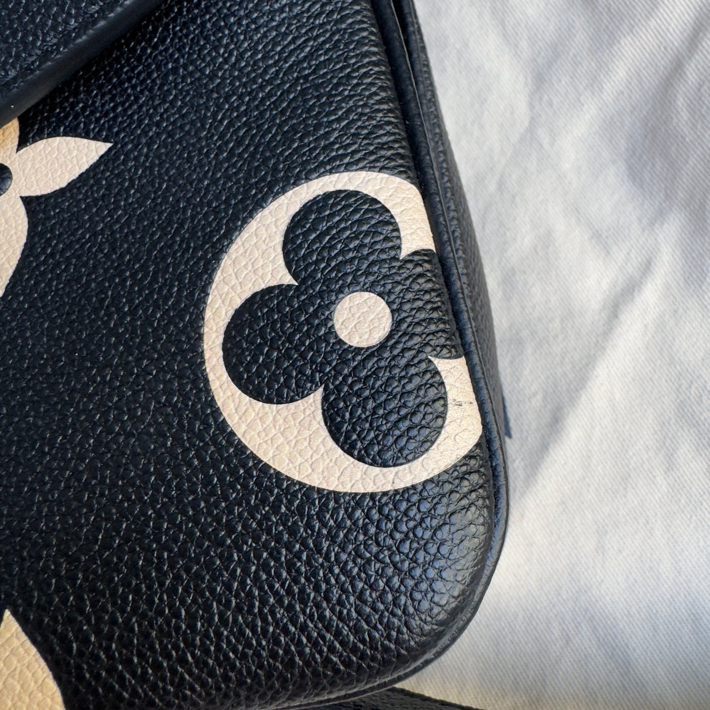 Louis Vuitton Bicolor Empreinte Leather Pochette Metis