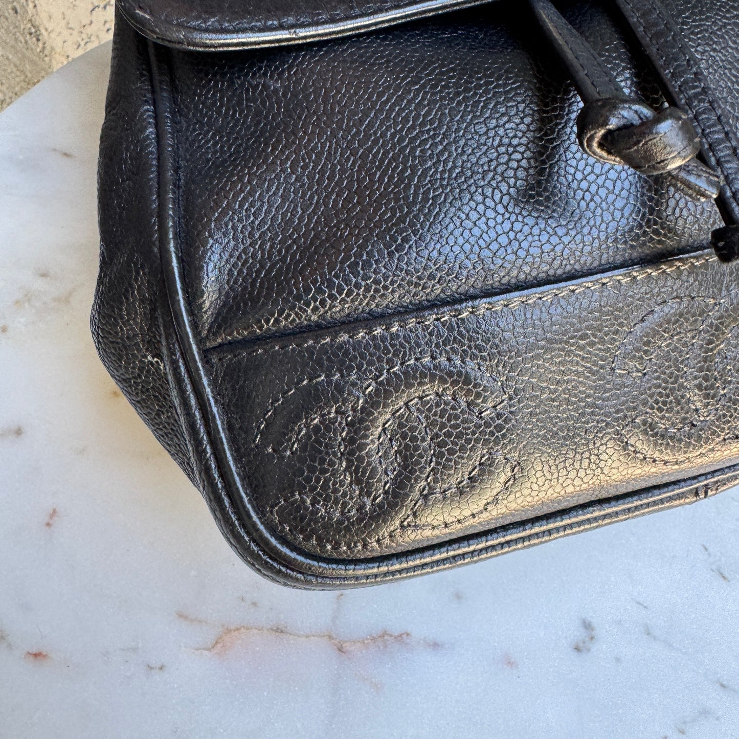 Chanel Vintage Triple Stitched CC Drawstring Flap Caviar Backpack