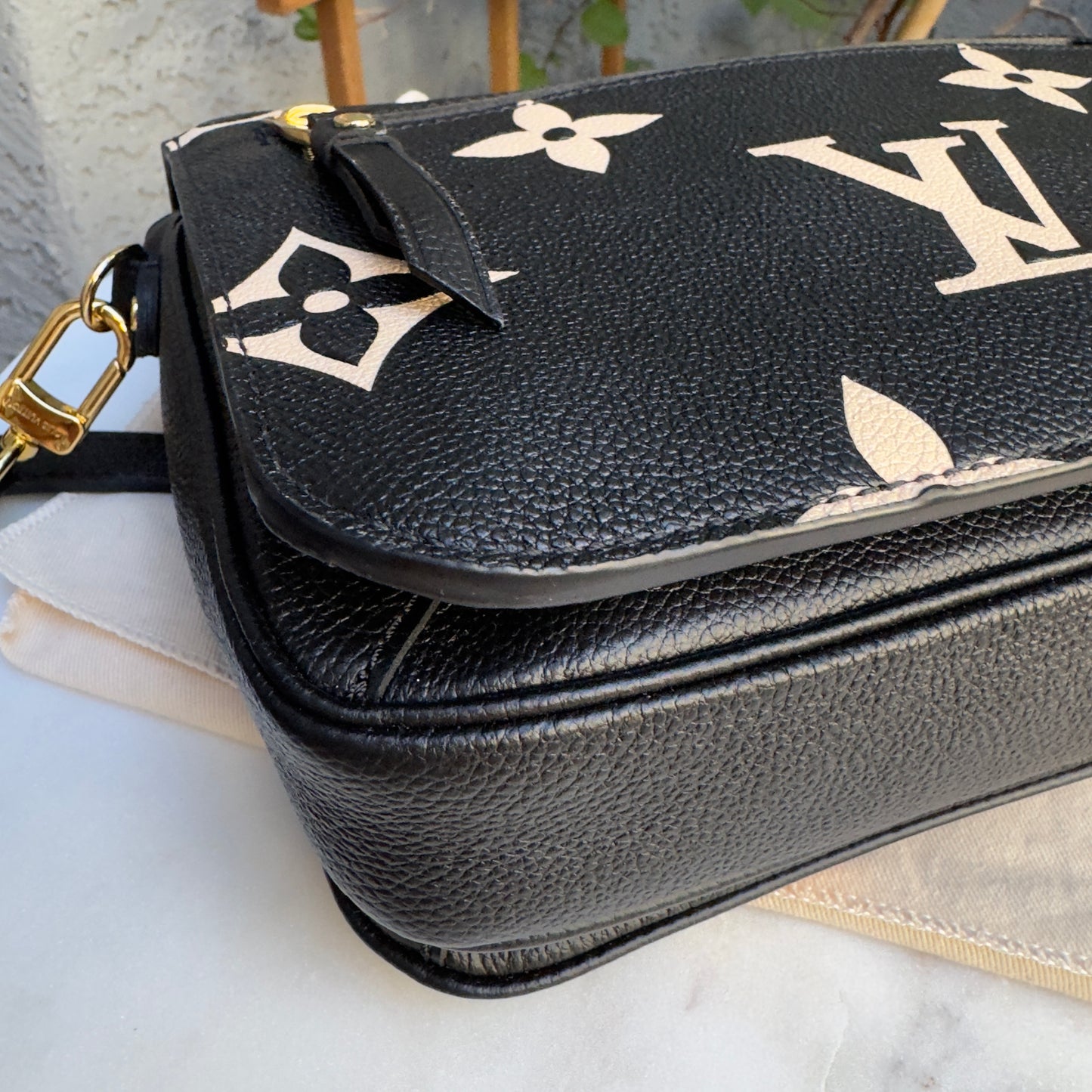 Louis Vuitton Bicolor Empreinte Leather Pochette Metis