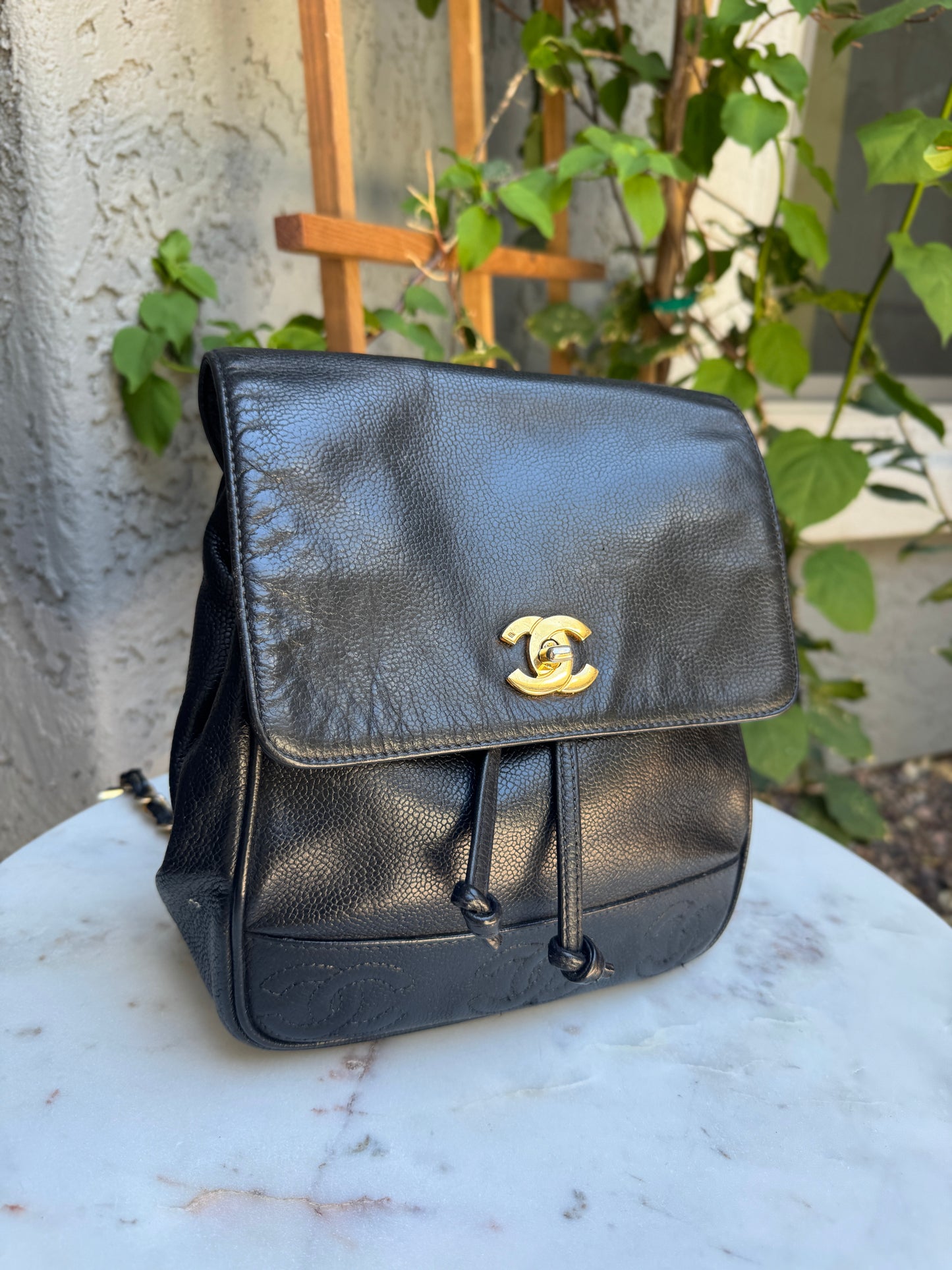 Chanel Vintage Triple Stitched CC Drawstring Flap Caviar Backpack