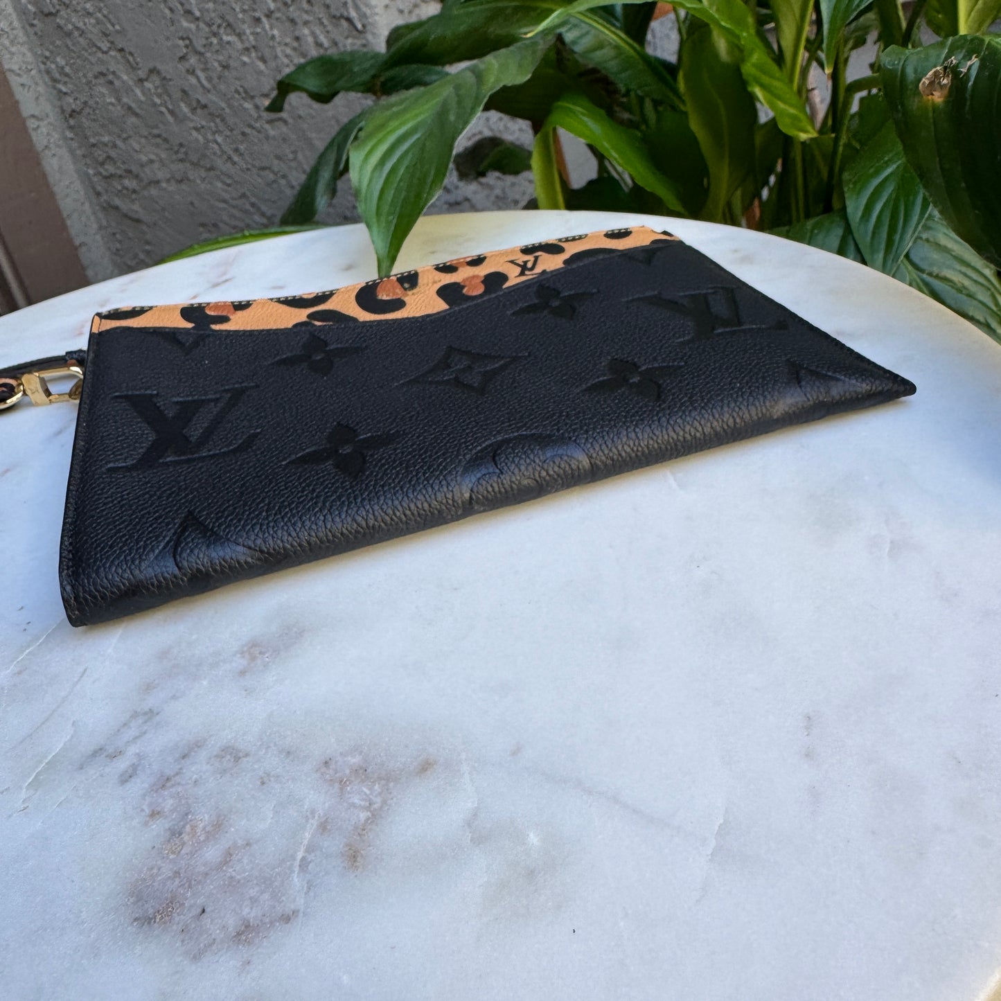 Louis Vuitton Empreinte Monogram Giant Wild at Heart Pochette Wristlet