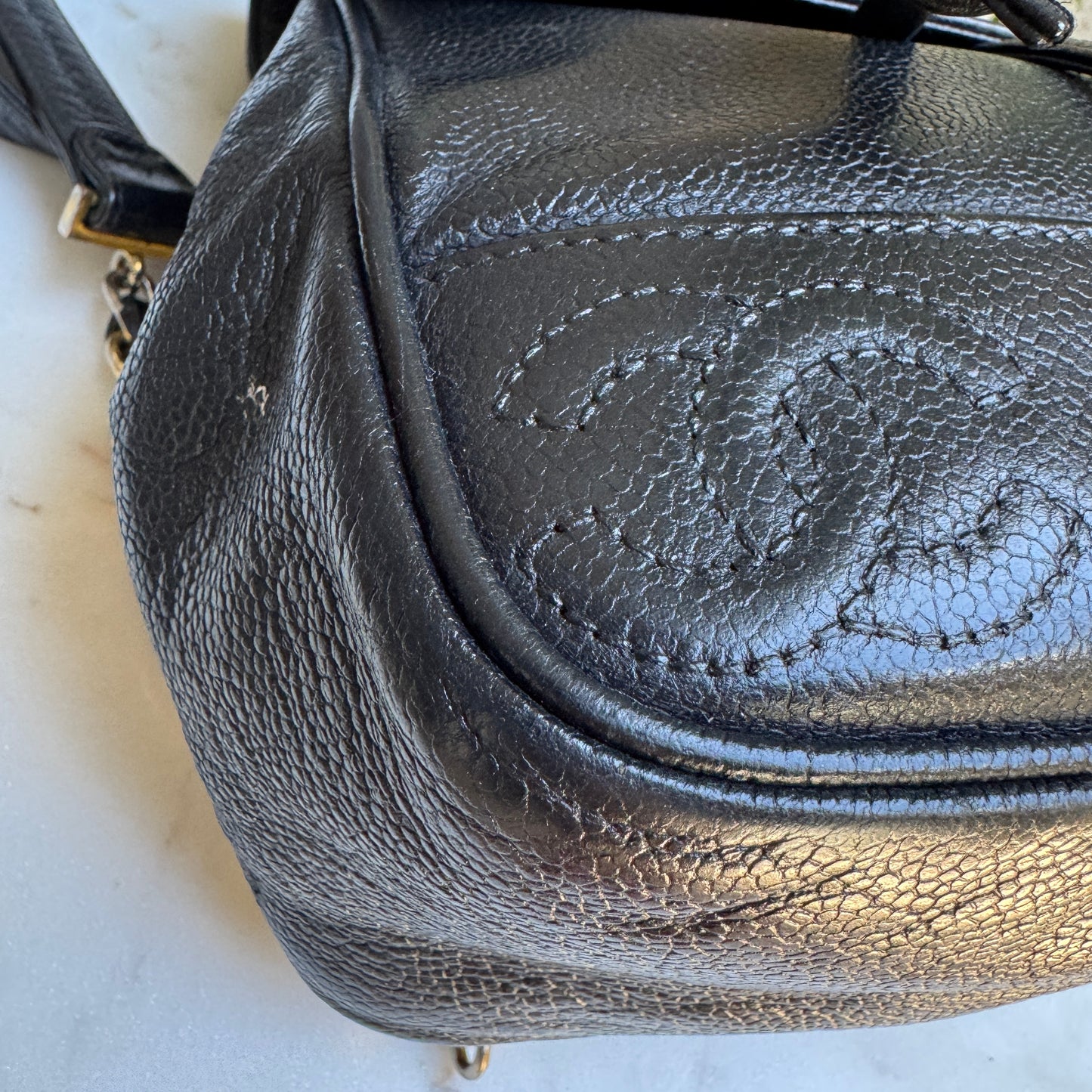 Chanel Vintage Triple Stitched CC Drawstring Flap Caviar Backpack