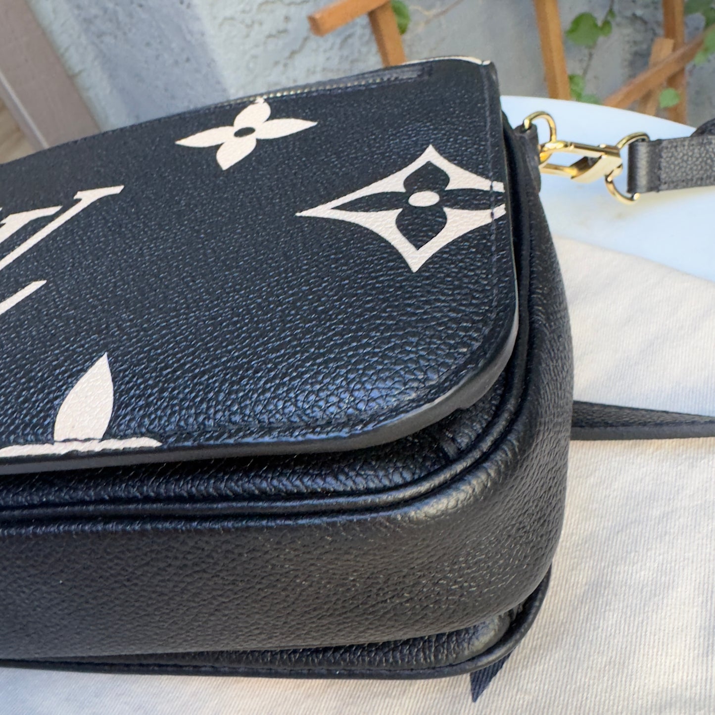 Louis Vuitton Bicolor Empreinte Leather Pochette Metis