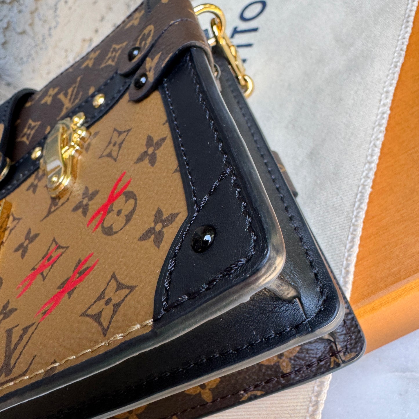 Louis Vuitton Reverse Monogram Trunk Clutch