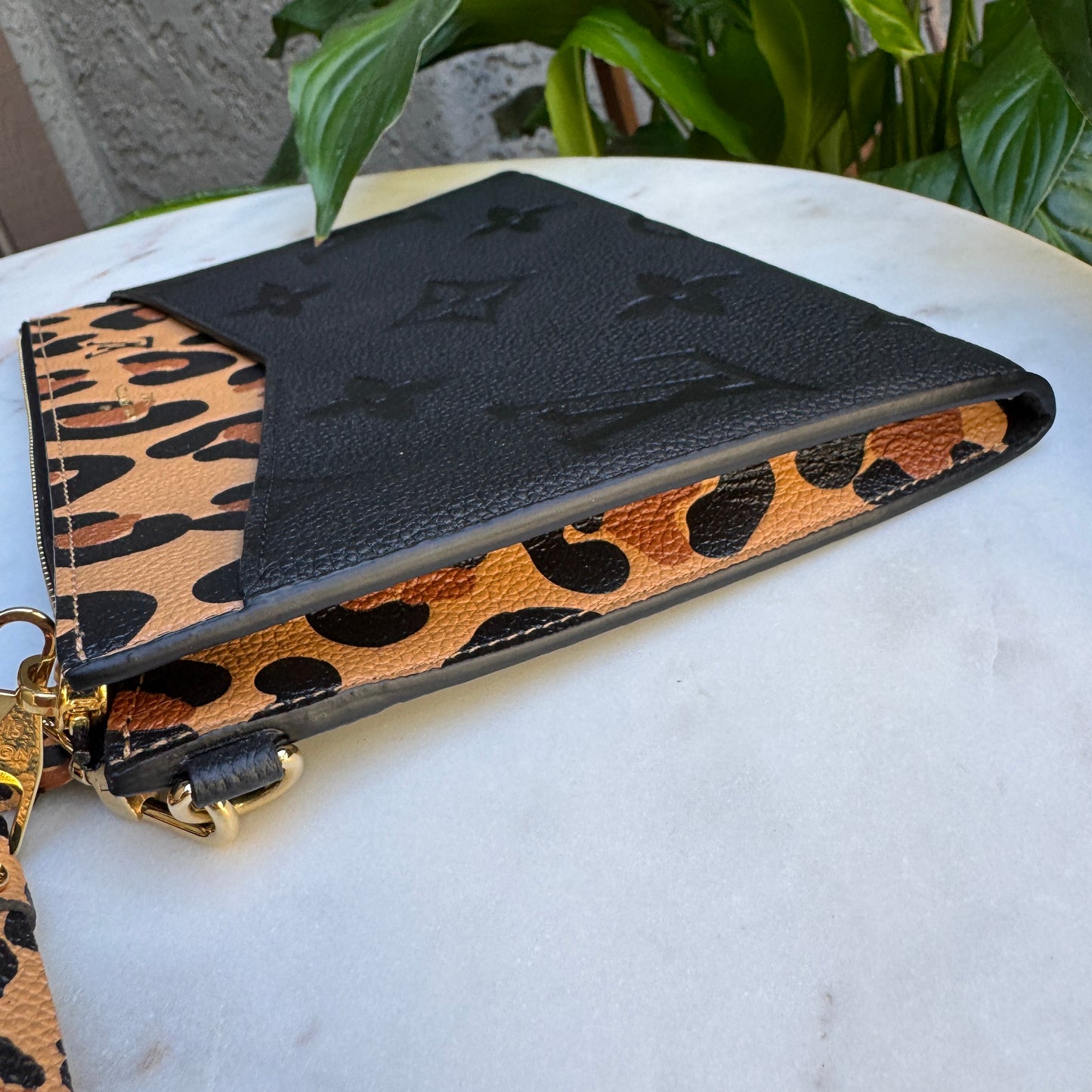 Louis Vuitton Empreinte Monogram Giant Wild at Heart Pochette Wristlet