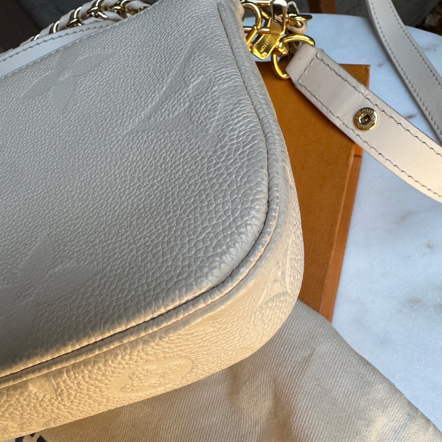 Louis Vuitton Multi Pochette Empreinte Crossbody