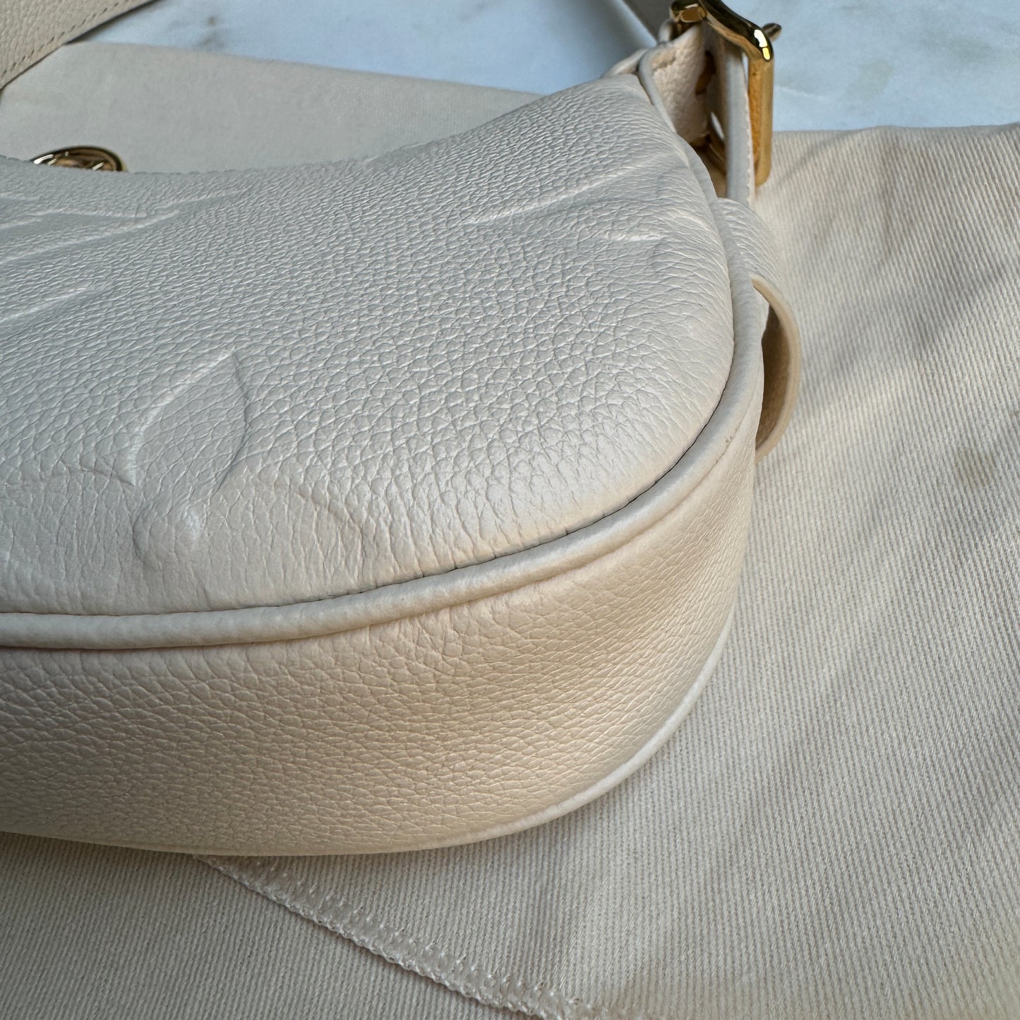 Louis Vuitton Empreinte Mini Moon