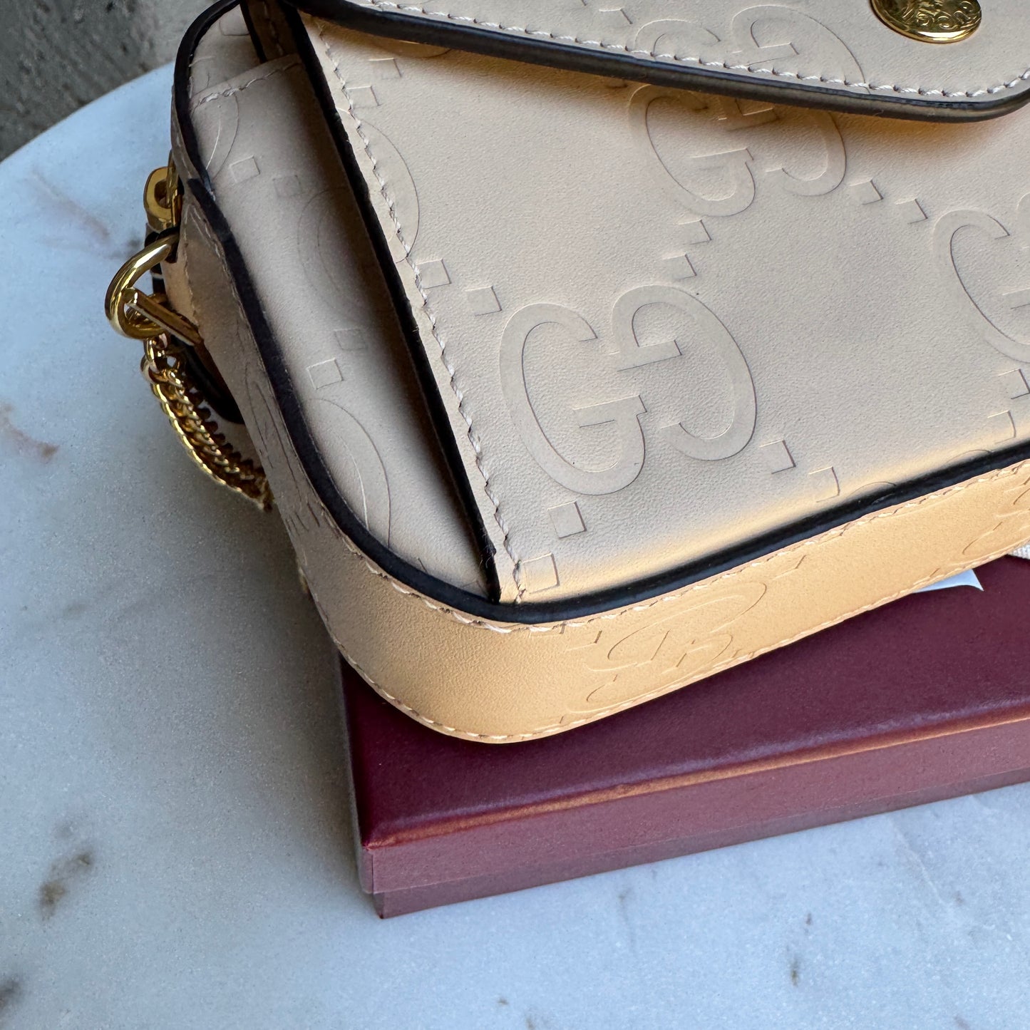 Gucci Calfskin GG Super Mini Debossed Chain Wallet Crossbody