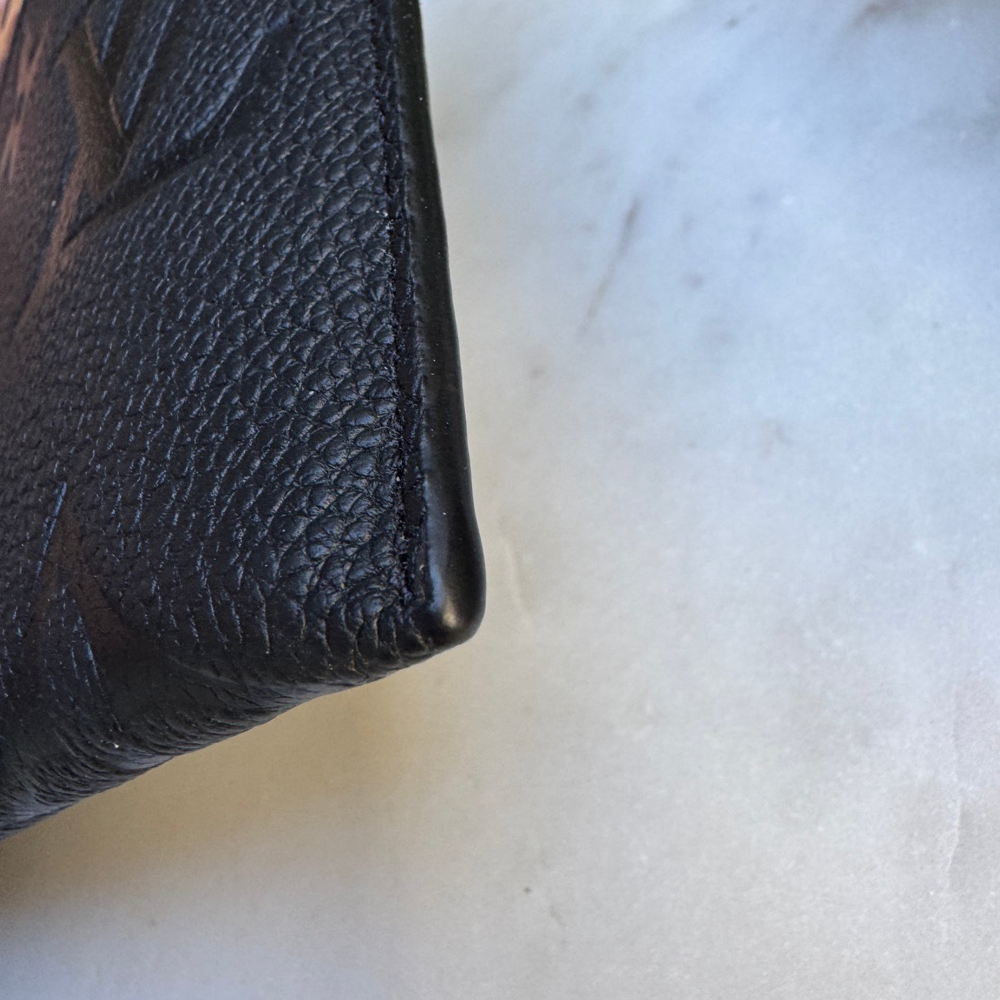 Louis Vuitton Empreinte Monogram Giant Wild at Heart Pochette Wristlet