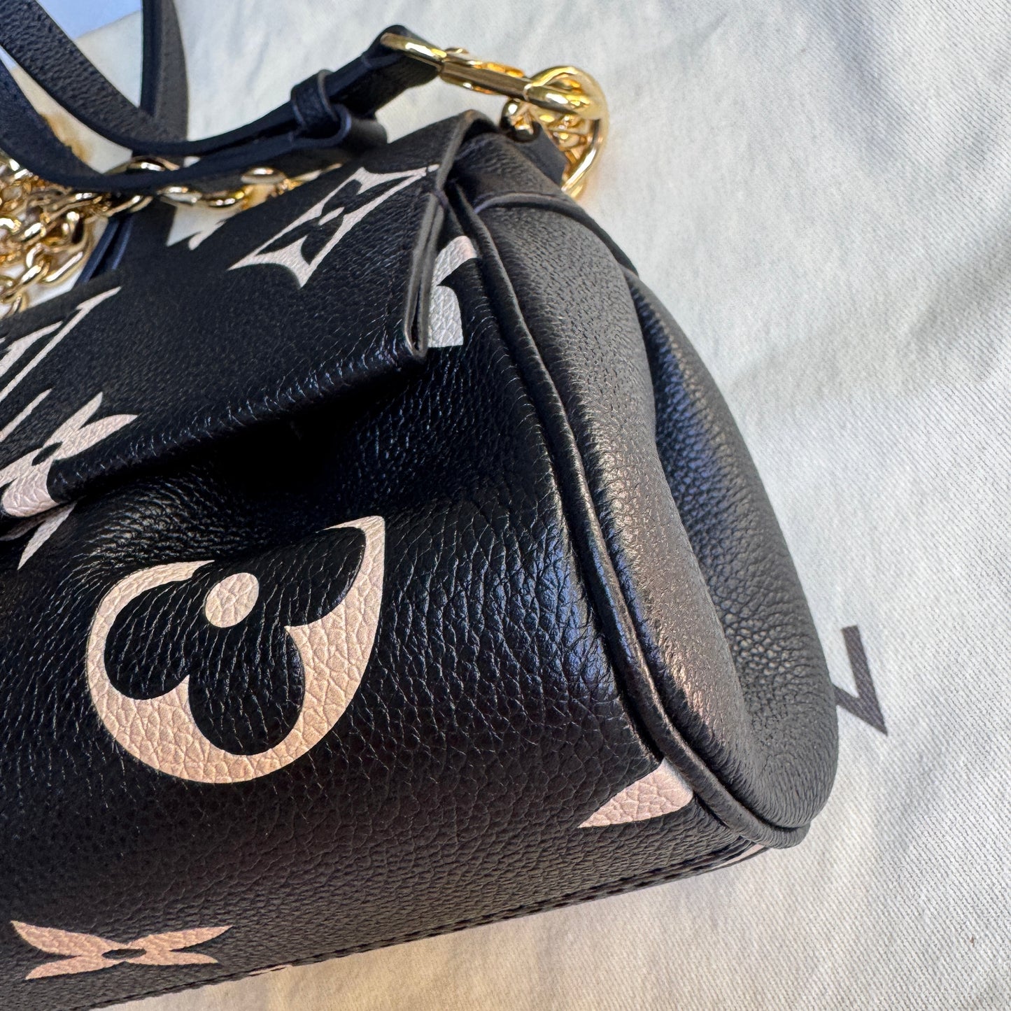 Louis Vuitton Giant Bicolor Monogram Empreinte Favorite NM Crossbody