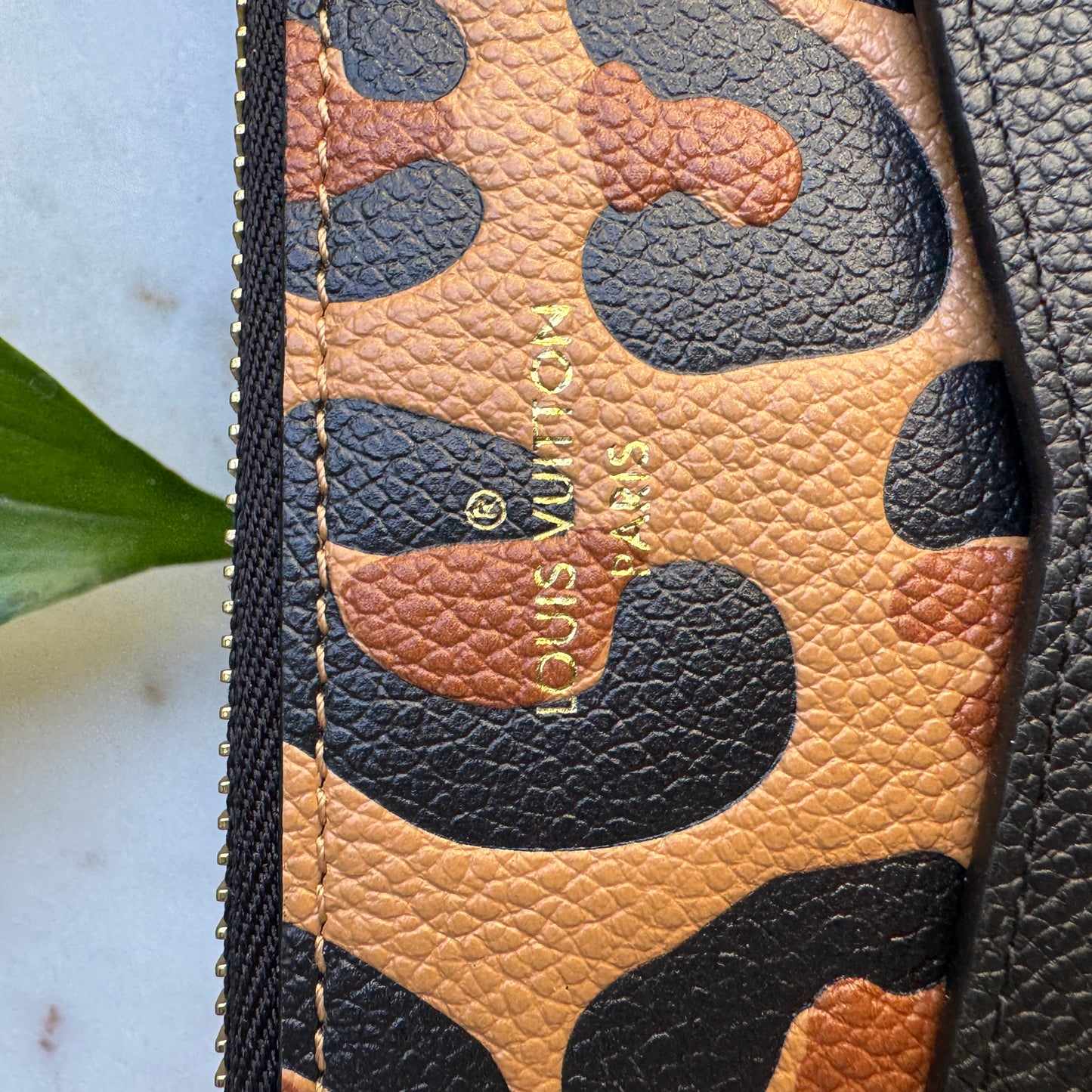 Louis Vuitton Empreinte Monogram Giant Wild at Heart Pochette Wristlet