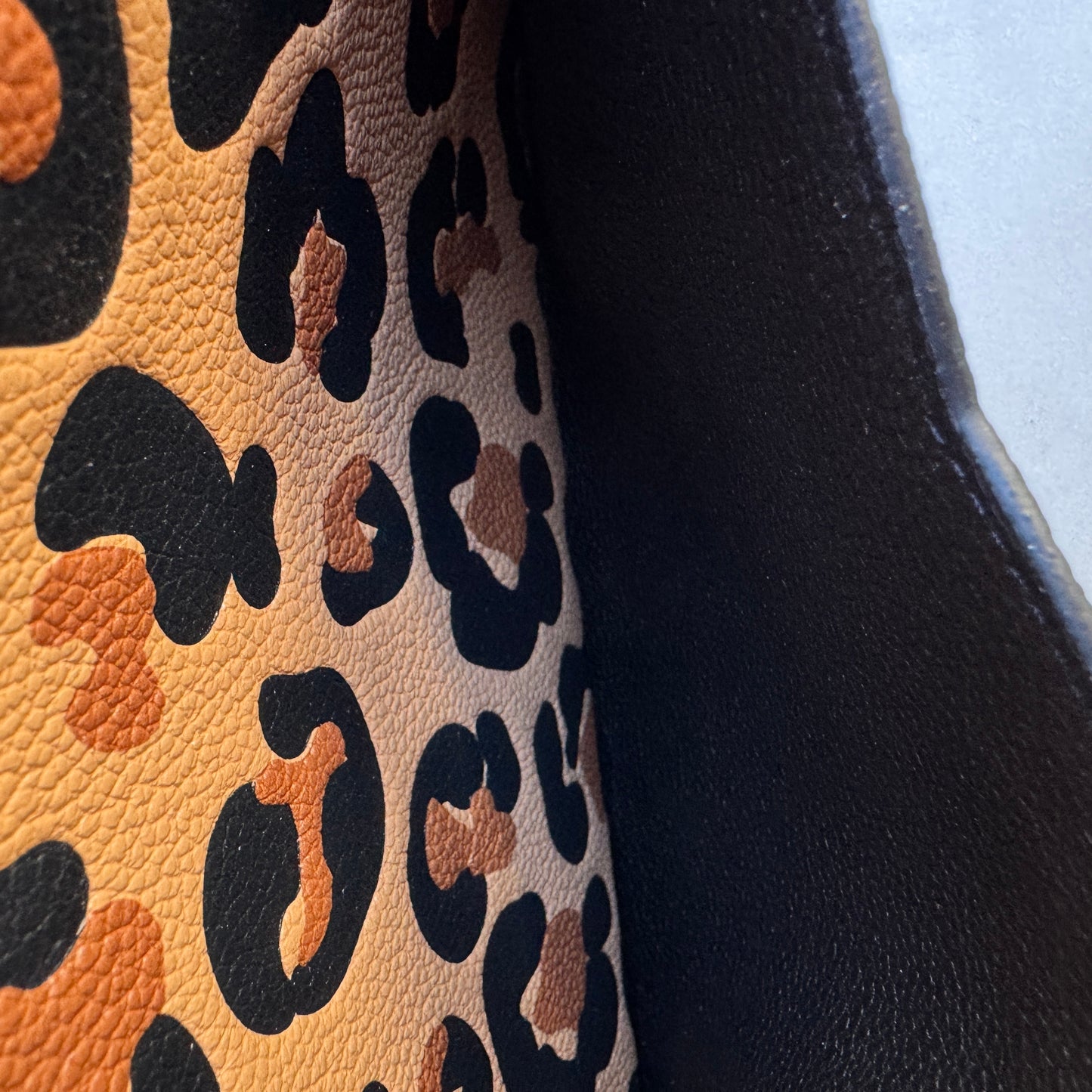 Louis Vuitton Empreinte Monogram Giant Wild at Heart Pochette Wristlet