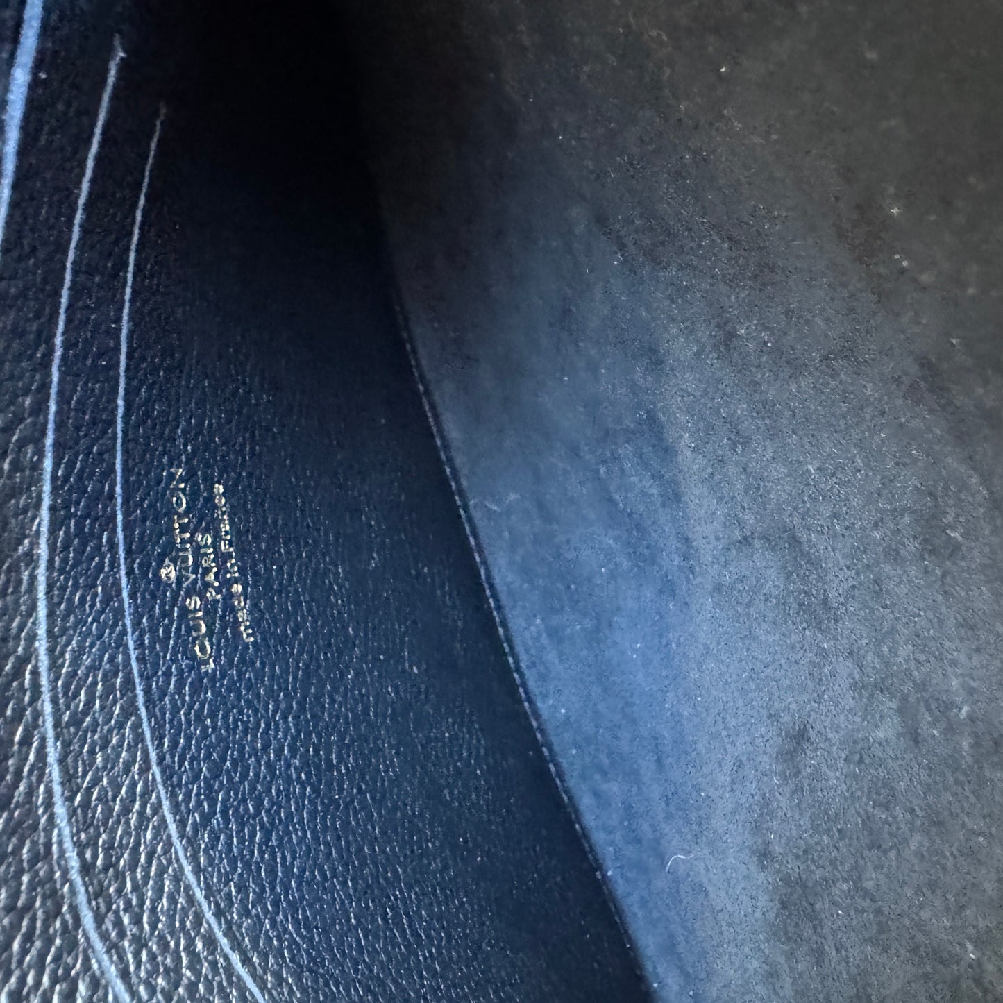 Louis Vuitton Empreinte Monogram Giant Wild at Heart Pochette Wristlet