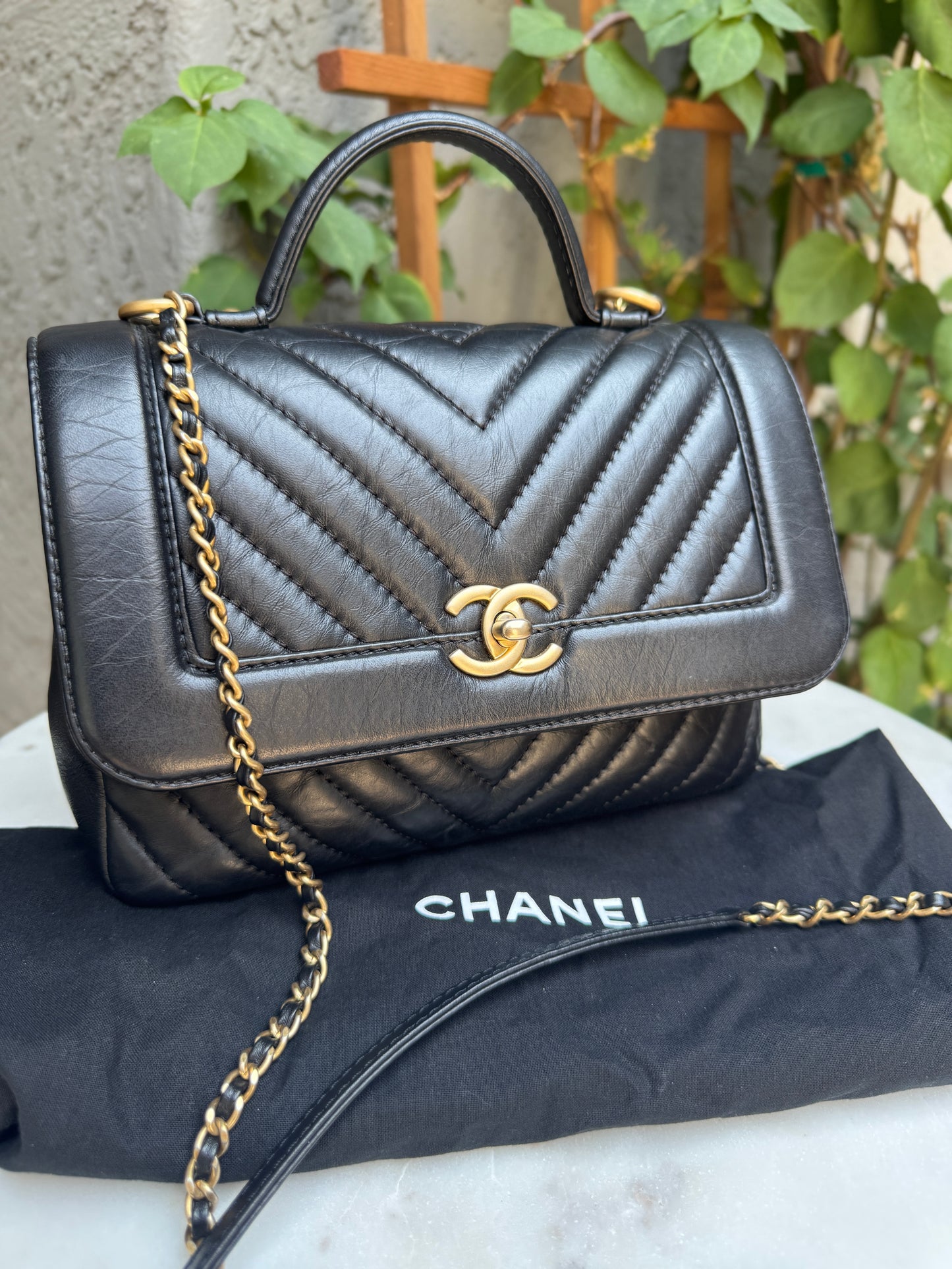Chanel Calfskin Chevron Quilted Top Handle Flap Crossbody