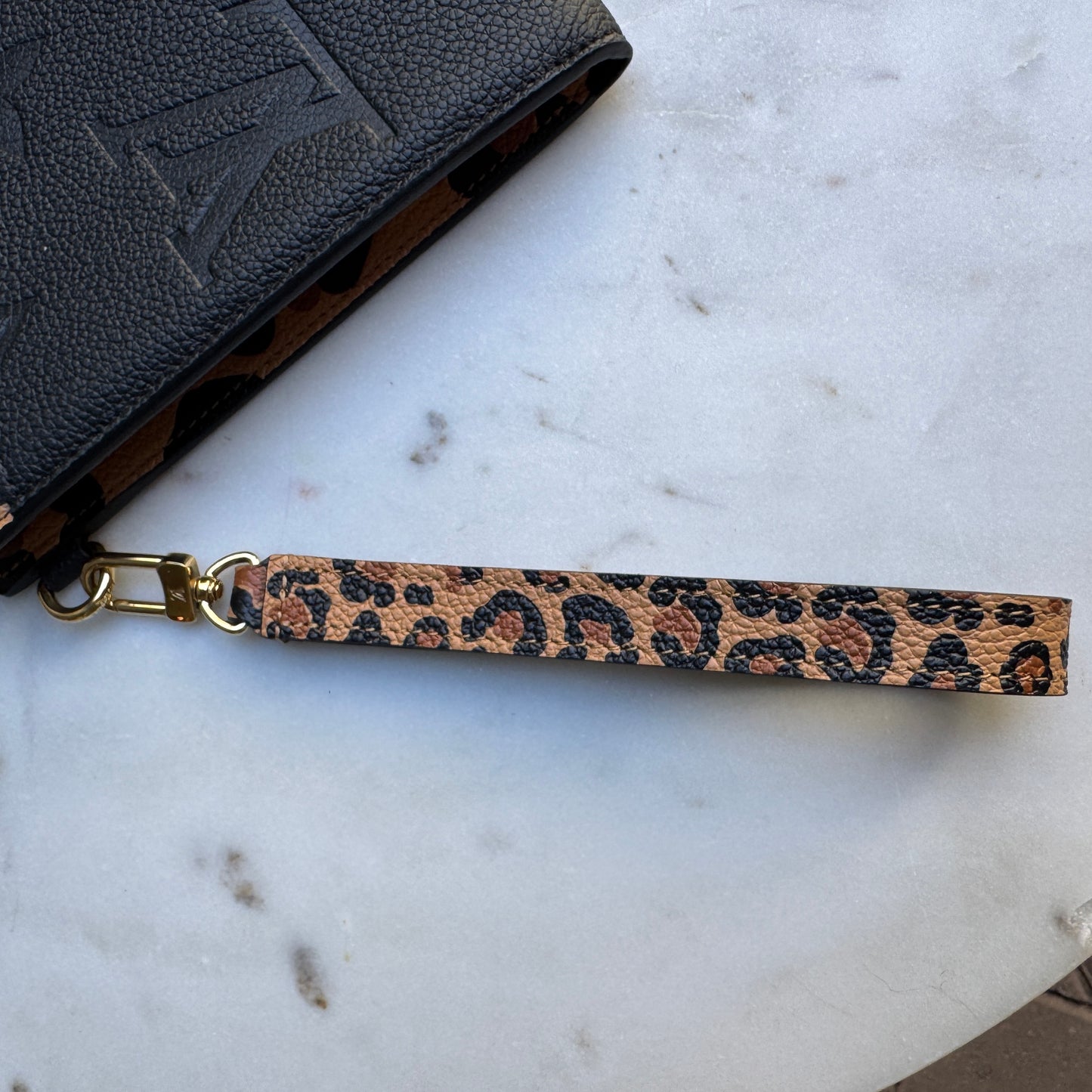 Louis Vuitton Empreinte Monogram Giant Wild at Heart Pochette Wristlet
