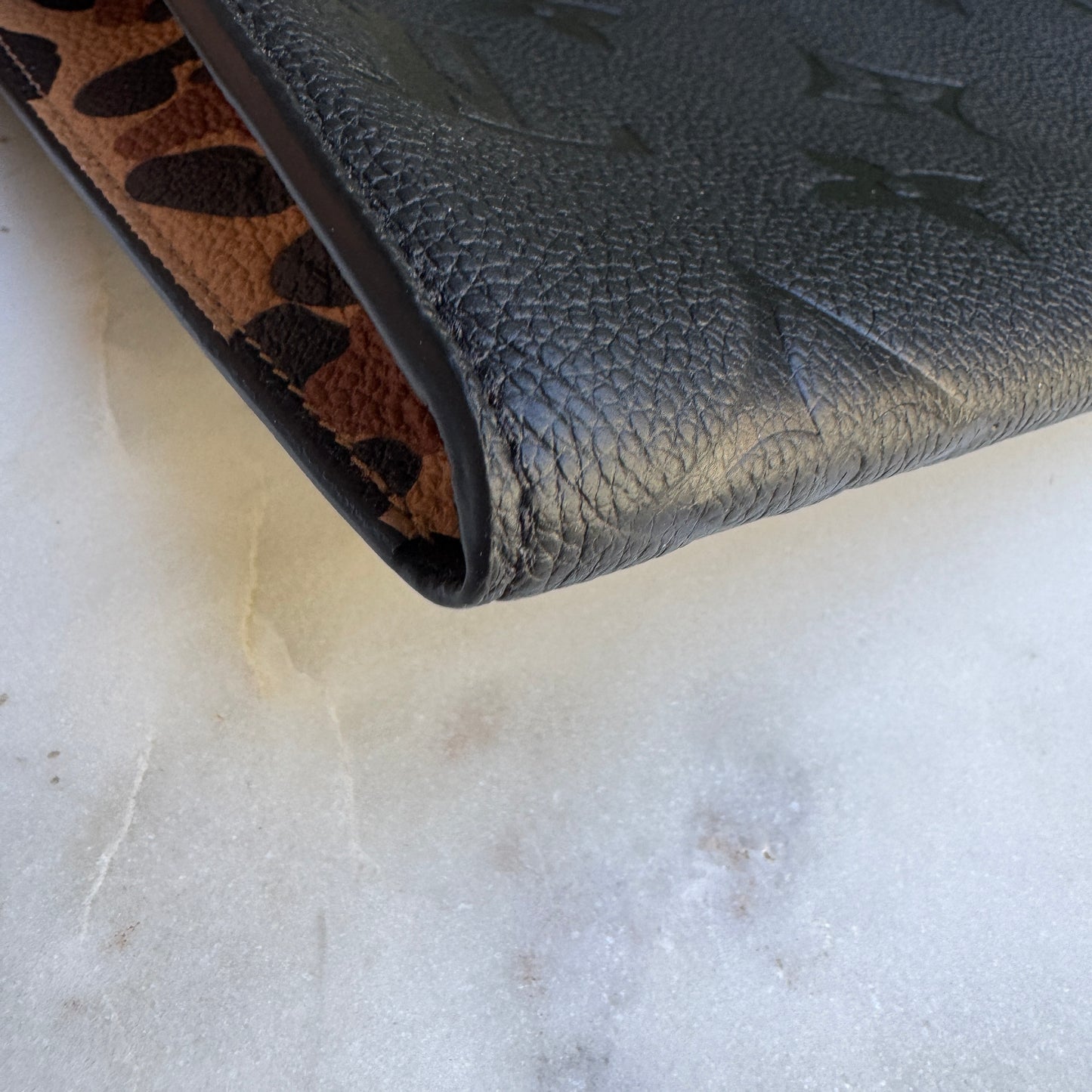 Louis Vuitton Empreinte Monogram Giant Wild at Heart Pochette Wristlet