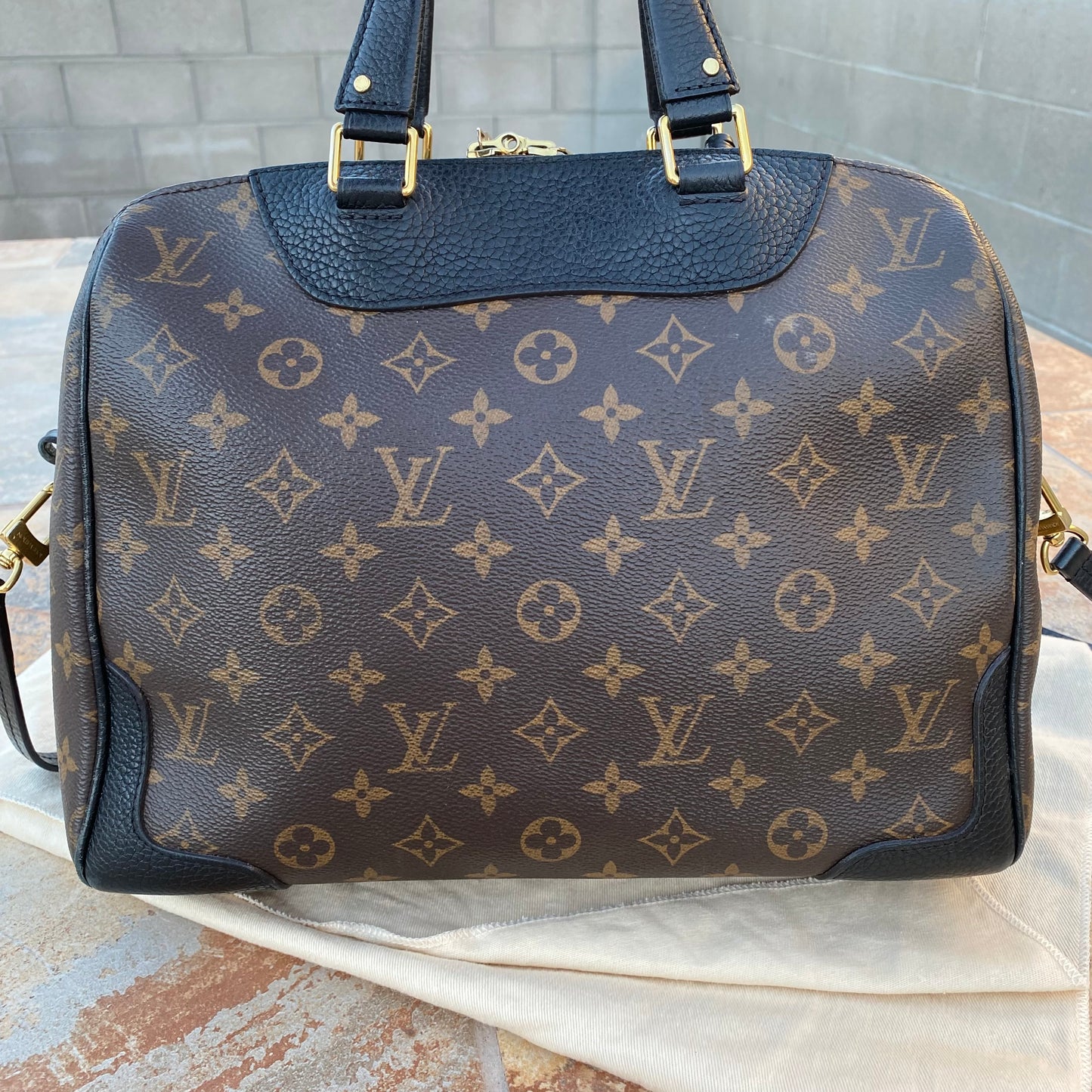 Louis Vuitton Leather and Monogram Canvas Retiro NM
