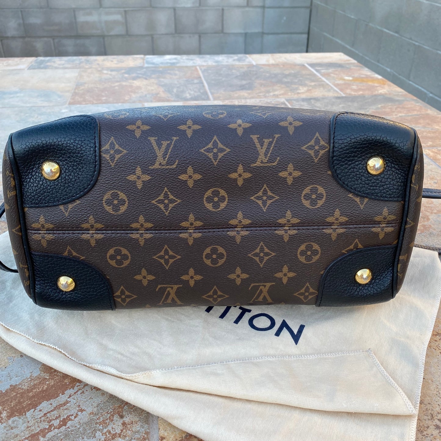 Louis Vuitton Leather and Monogram Canvas Retiro NM