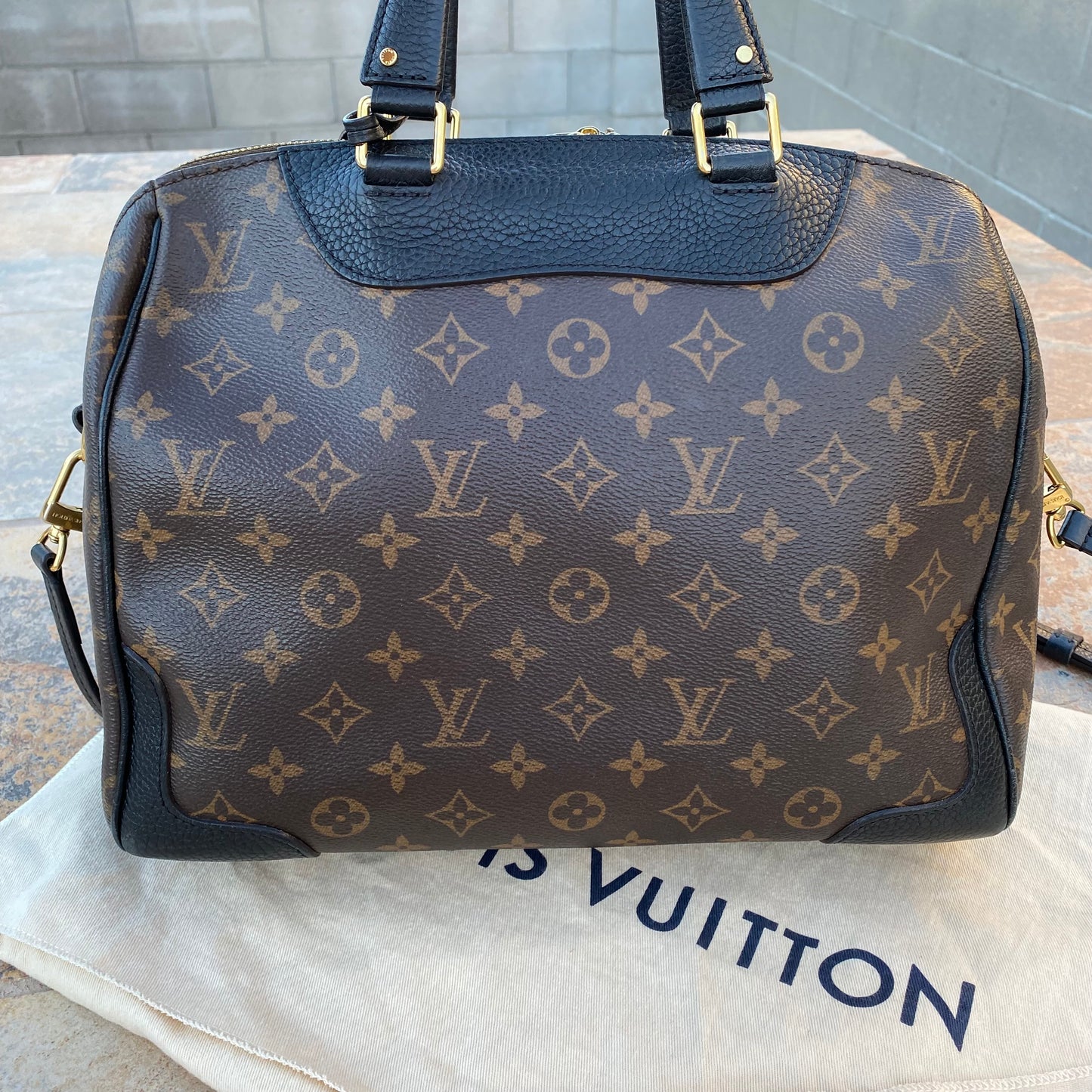 Louis Vuitton Leather and Monogram Canvas Retiro NM